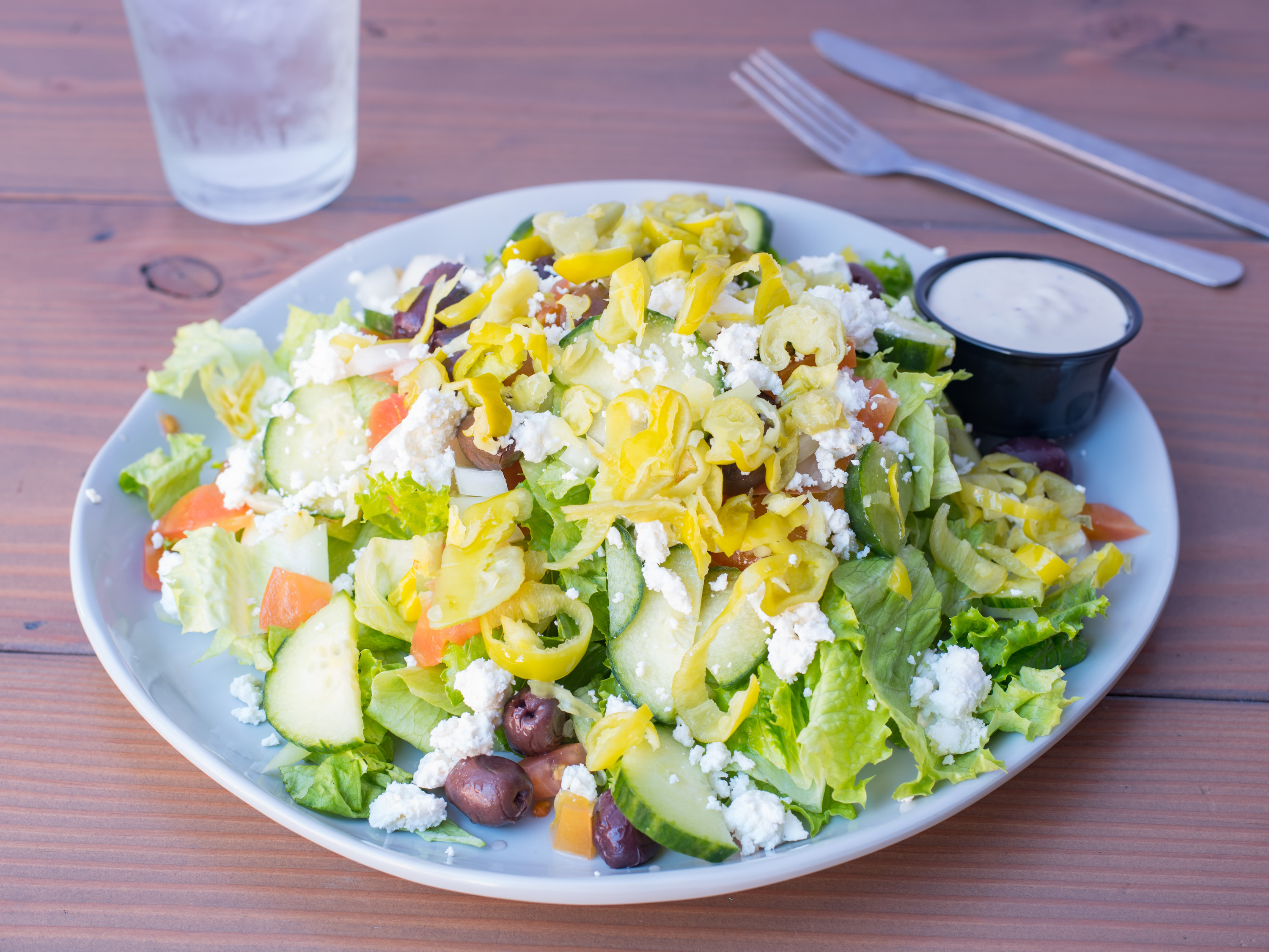 Order Greek Salad food online from Gaslamp Burger store, San Diego on bringmethat.com