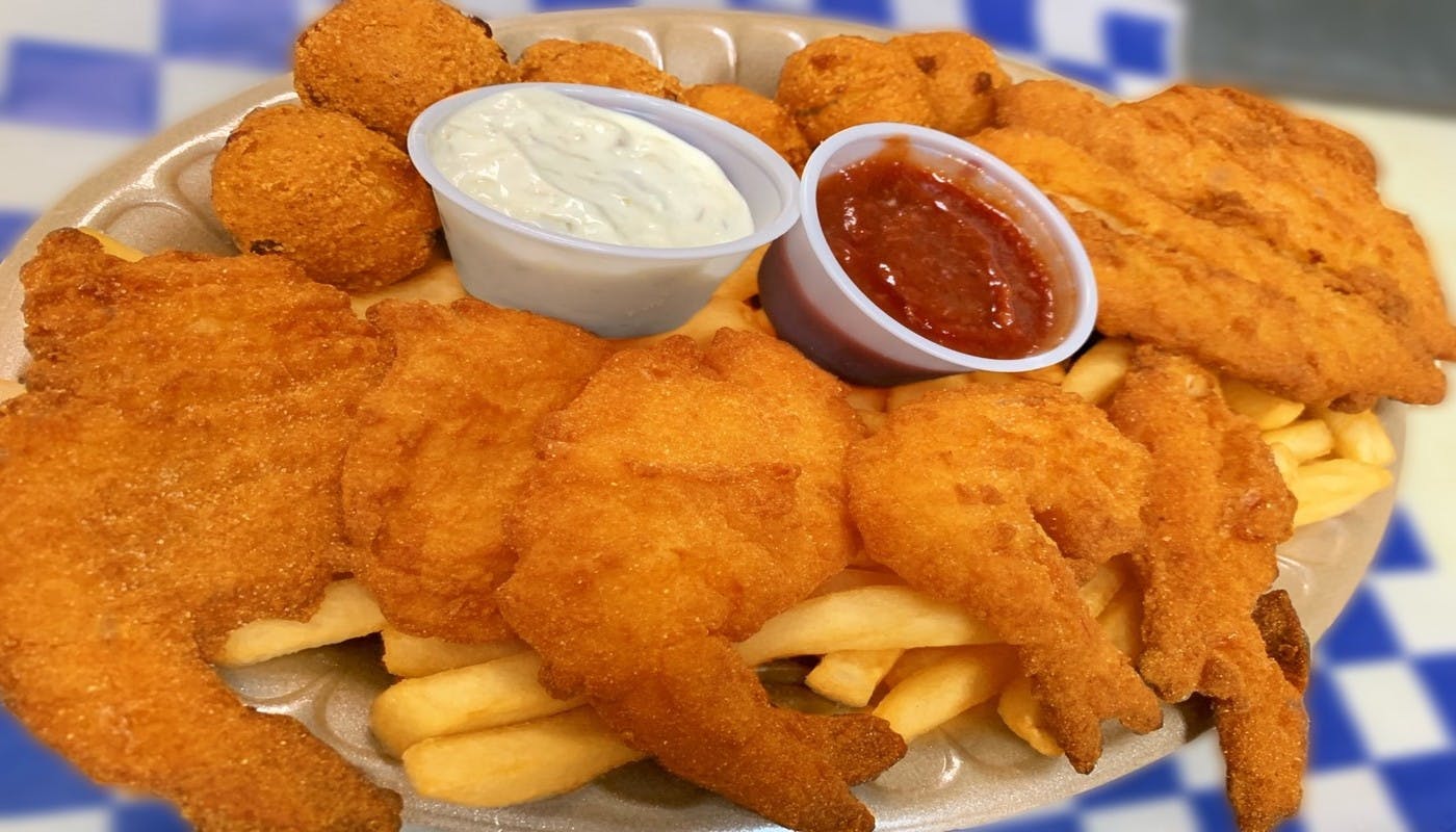 Order Double Catch - Entree food online from Village Pizza & Seafood store, Dickinson on bringmethat.com