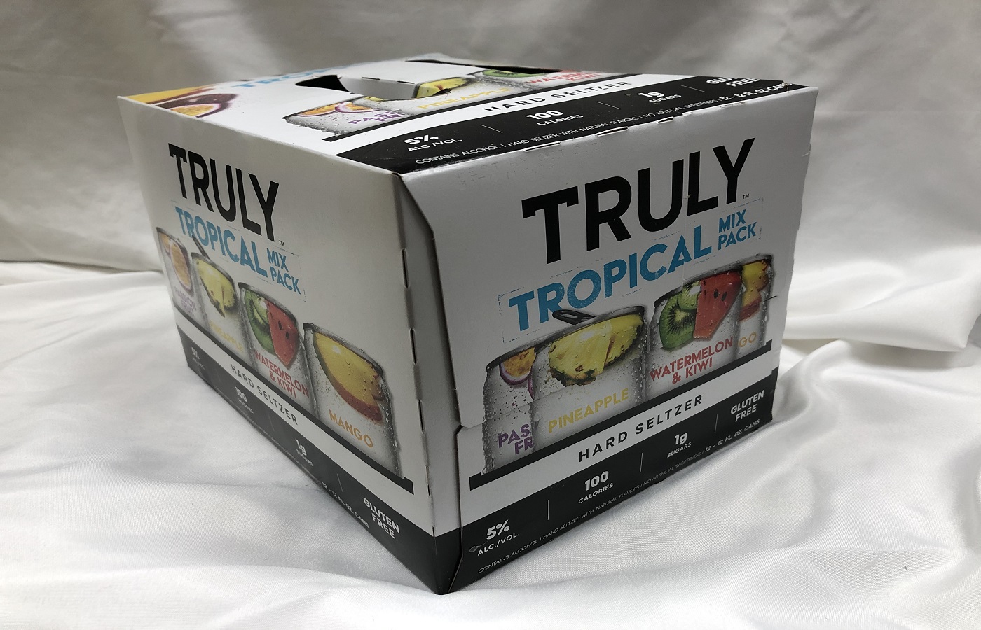 Order Truly Hard Seltzer Tropical Mix Pack Spiked 12 Pack 12 oz. food online from Sb Liquor & Crafts store, Santa Barbara on bringmethat.com