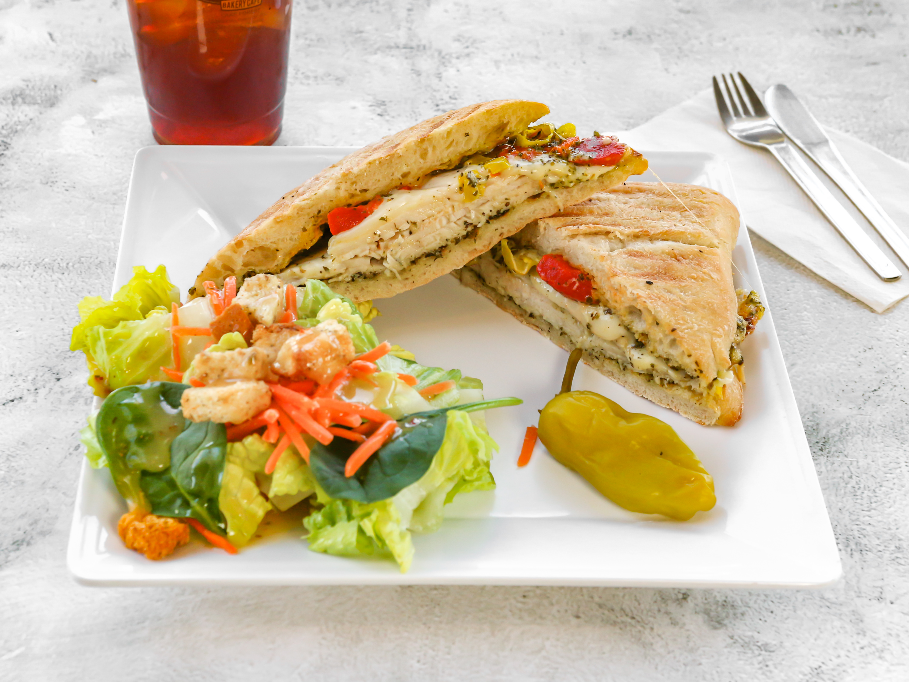 Order Sicilian Turkey Panini food online from Java Bakery Cafe Lake Forest store, Lake Forest on bringmethat.com