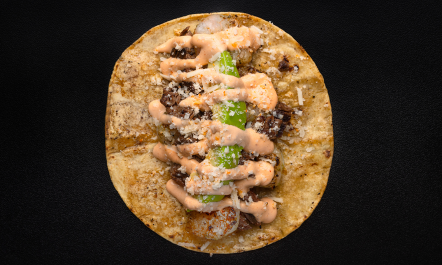 Order Surf & Turf Taco food online from Lucha Libre Taco Shop store, San Diego on bringmethat.com