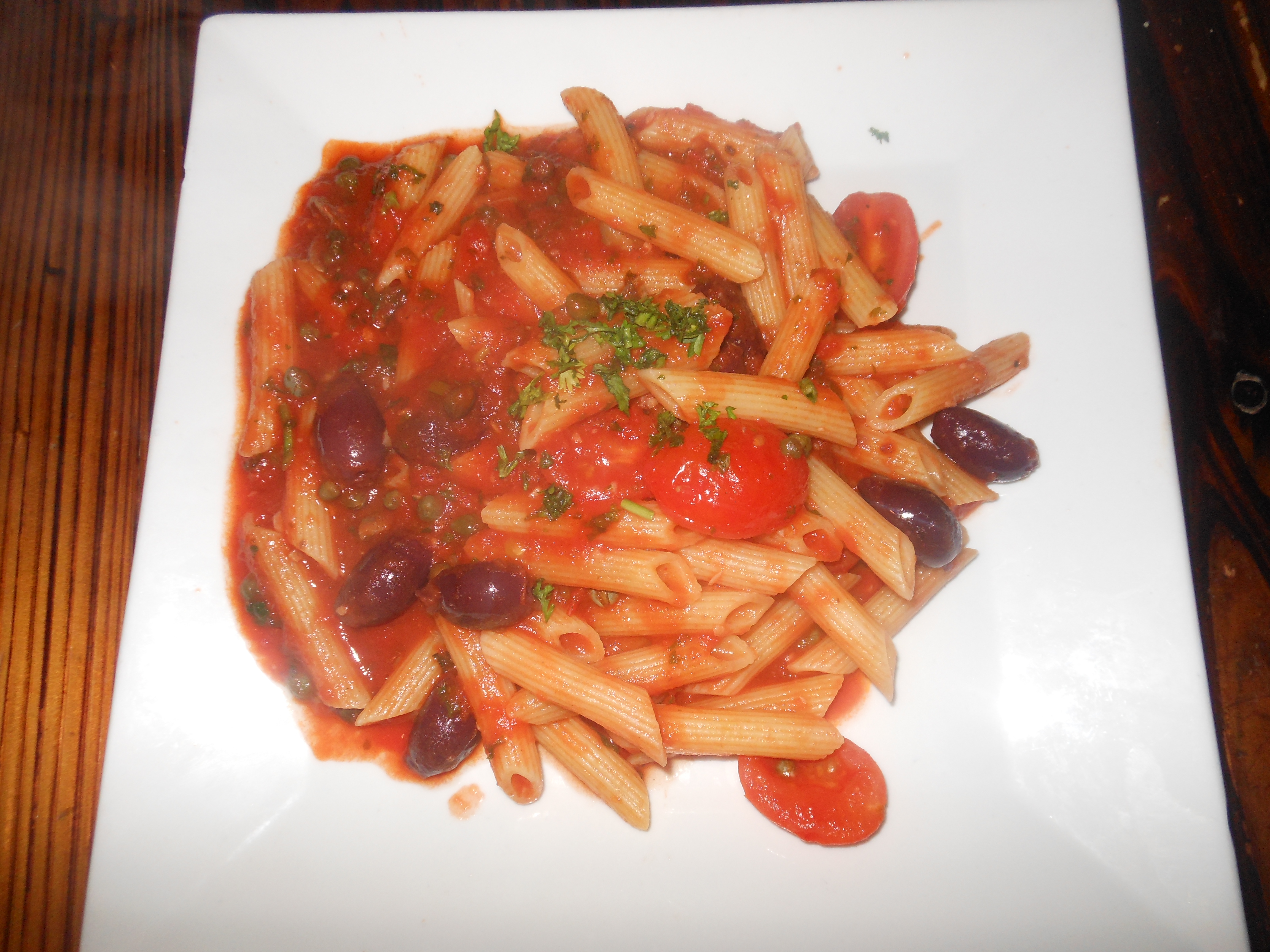 Order Penne alla Puttanesca food online from Tuscan hills store, Forest Hills on bringmethat.com