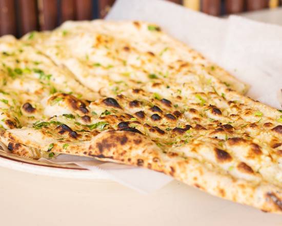 Order Garlic Basil Naan food online from Incredible India Cafe store, Los Angeles on bringmethat.com