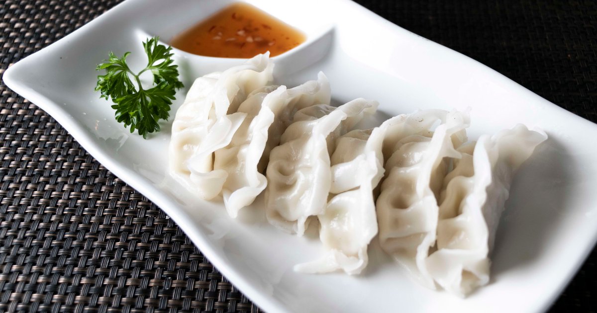Order Steamed Dumplings food online from New China Restaurant store, Cary on bringmethat.com