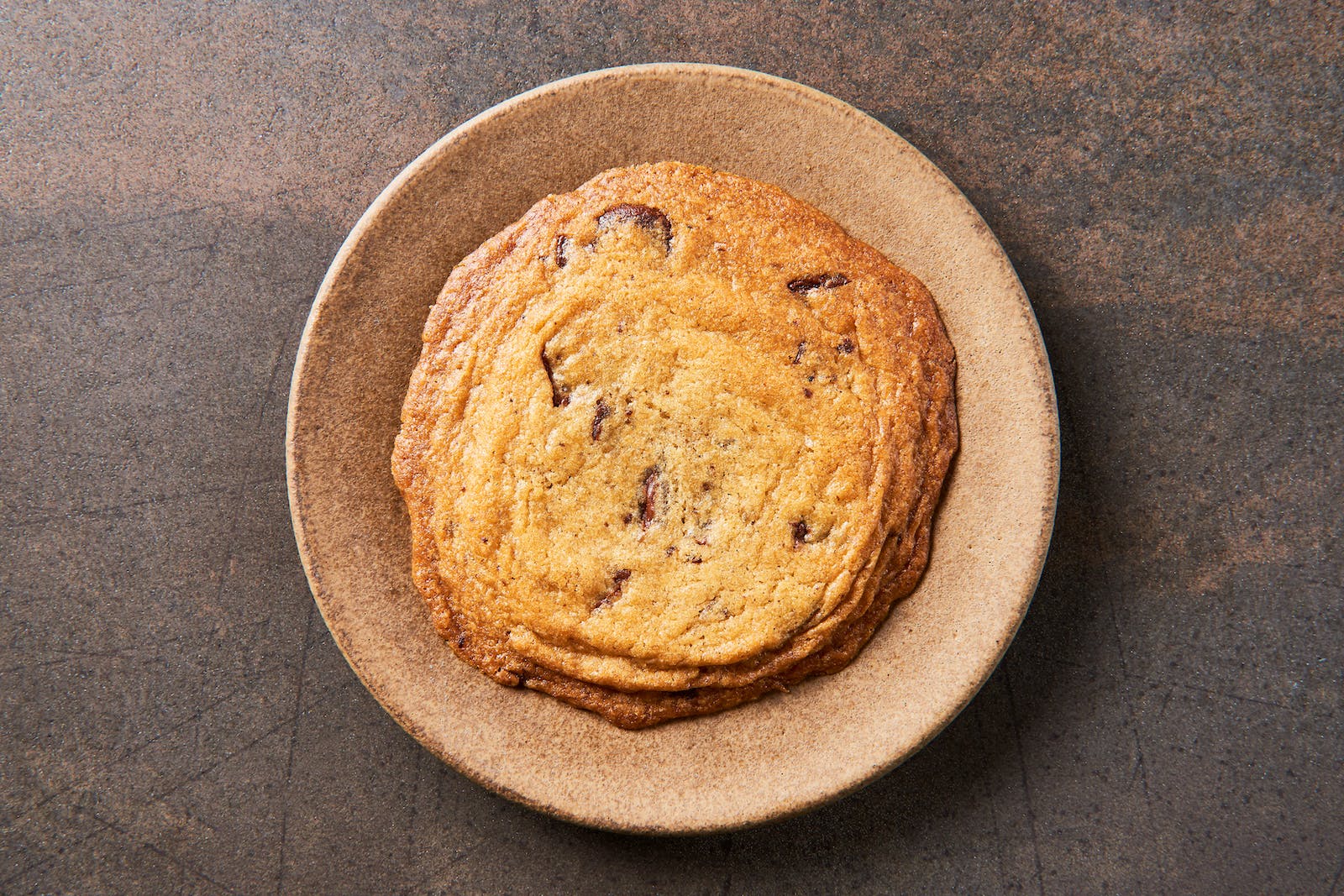 Order Brown Butter Chocolate Chip Cookie - Dessert food online from Sunset Squares Slice Shop store, San Francisco on bringmethat.com