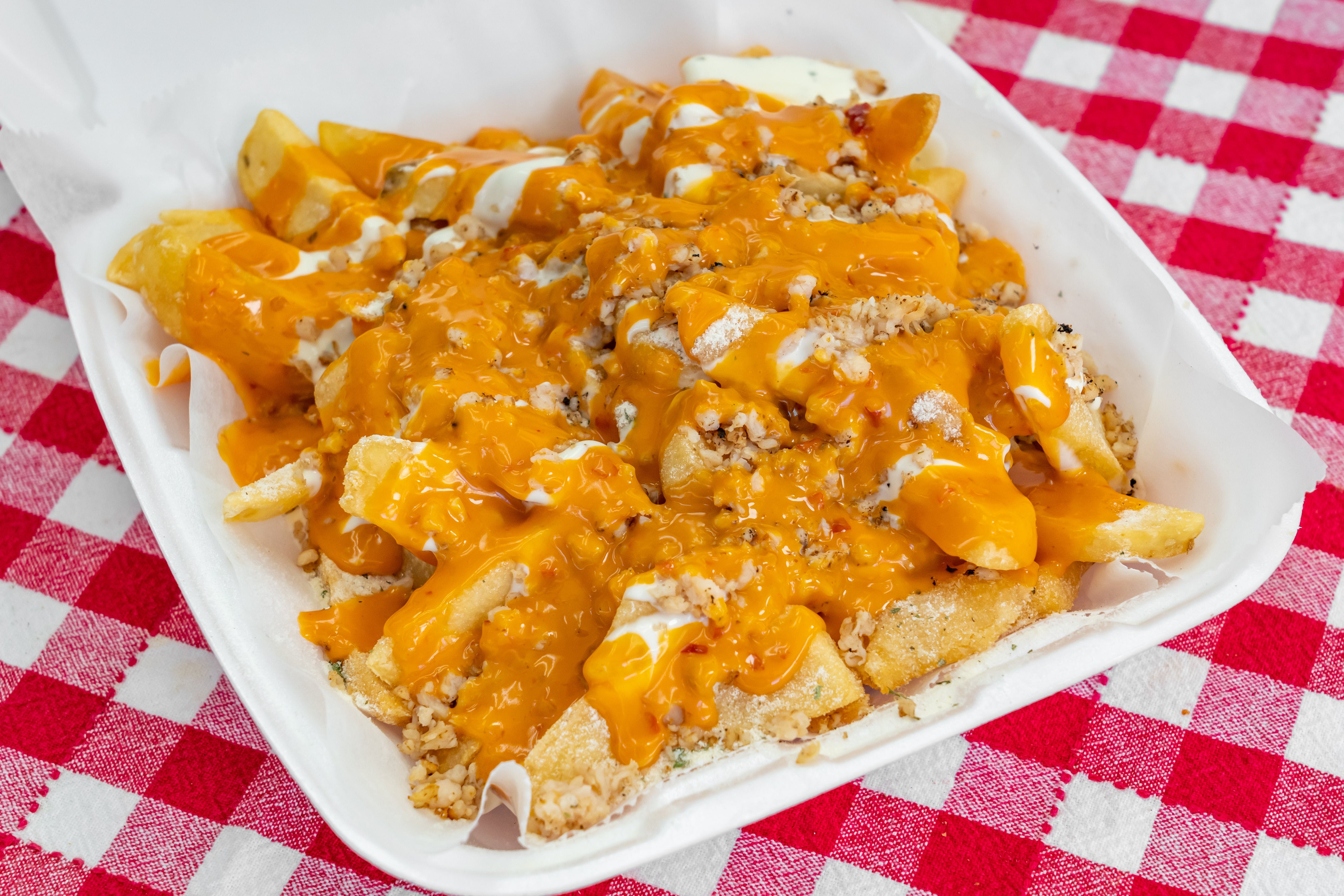 Order Loaded Cheese Fries - Sides food online from Golden Edge Pizza store, Dearborn Heights on bringmethat.com