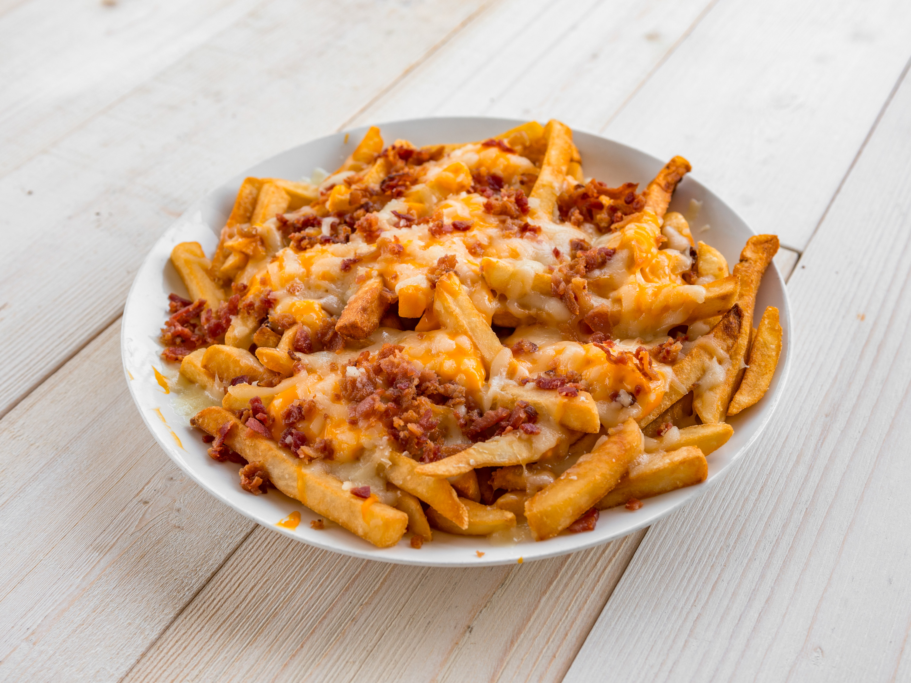 Order Bucket of Cheese Fries food online from Carmelo's Pizza store, Boyertown on bringmethat.com