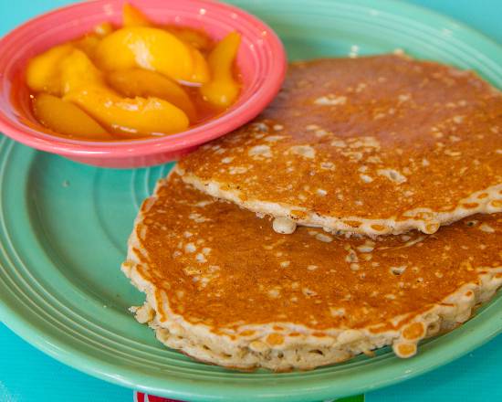Order Organic Oatmeal Pancake With Peaches food online from Flying Biscuit Cafe store, Peachtree City on bringmethat.com