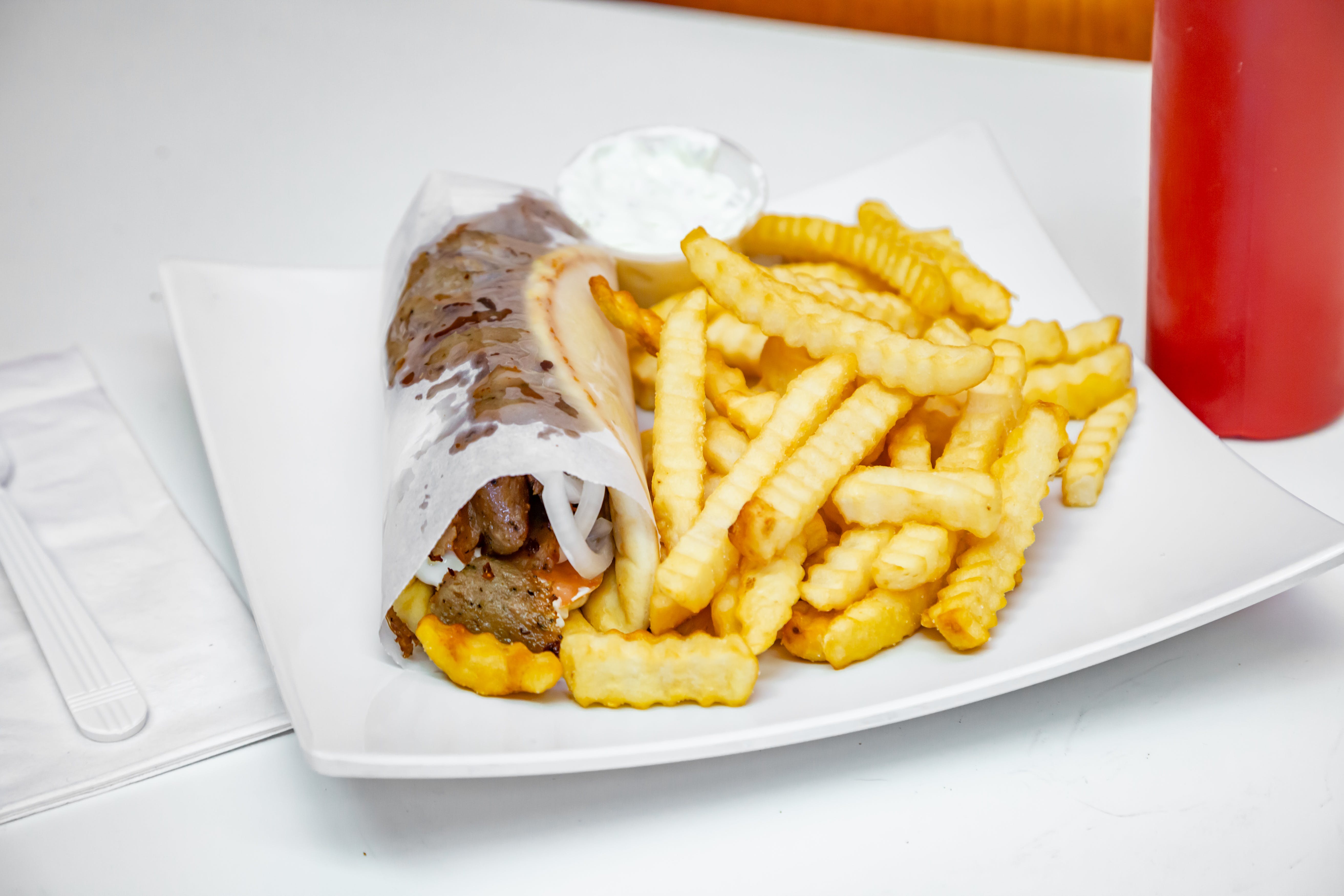 Order Gyro with Fries - Gyro food online from Benny's Pizza store, Chicago on bringmethat.com