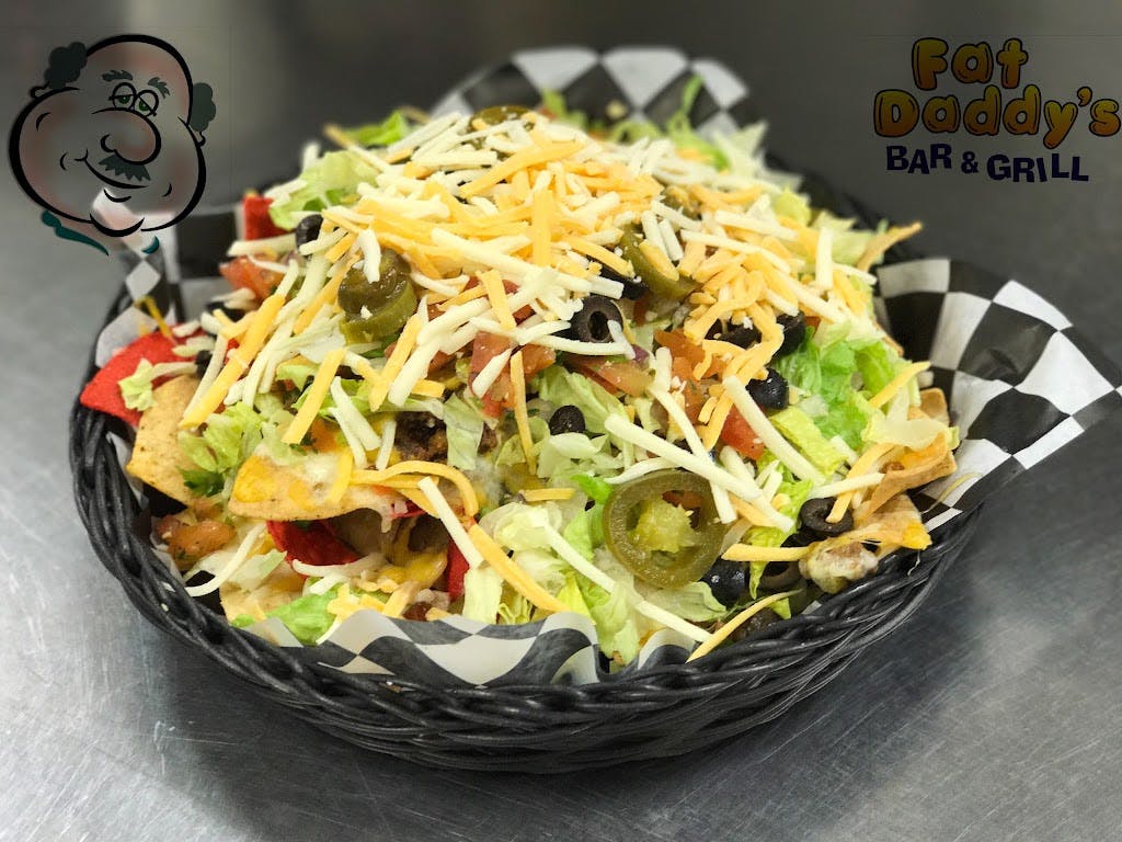 Order Taco Salad - Field of Greens food online from Fat Daddy Bar & Grill store, Alexandria on bringmethat.com