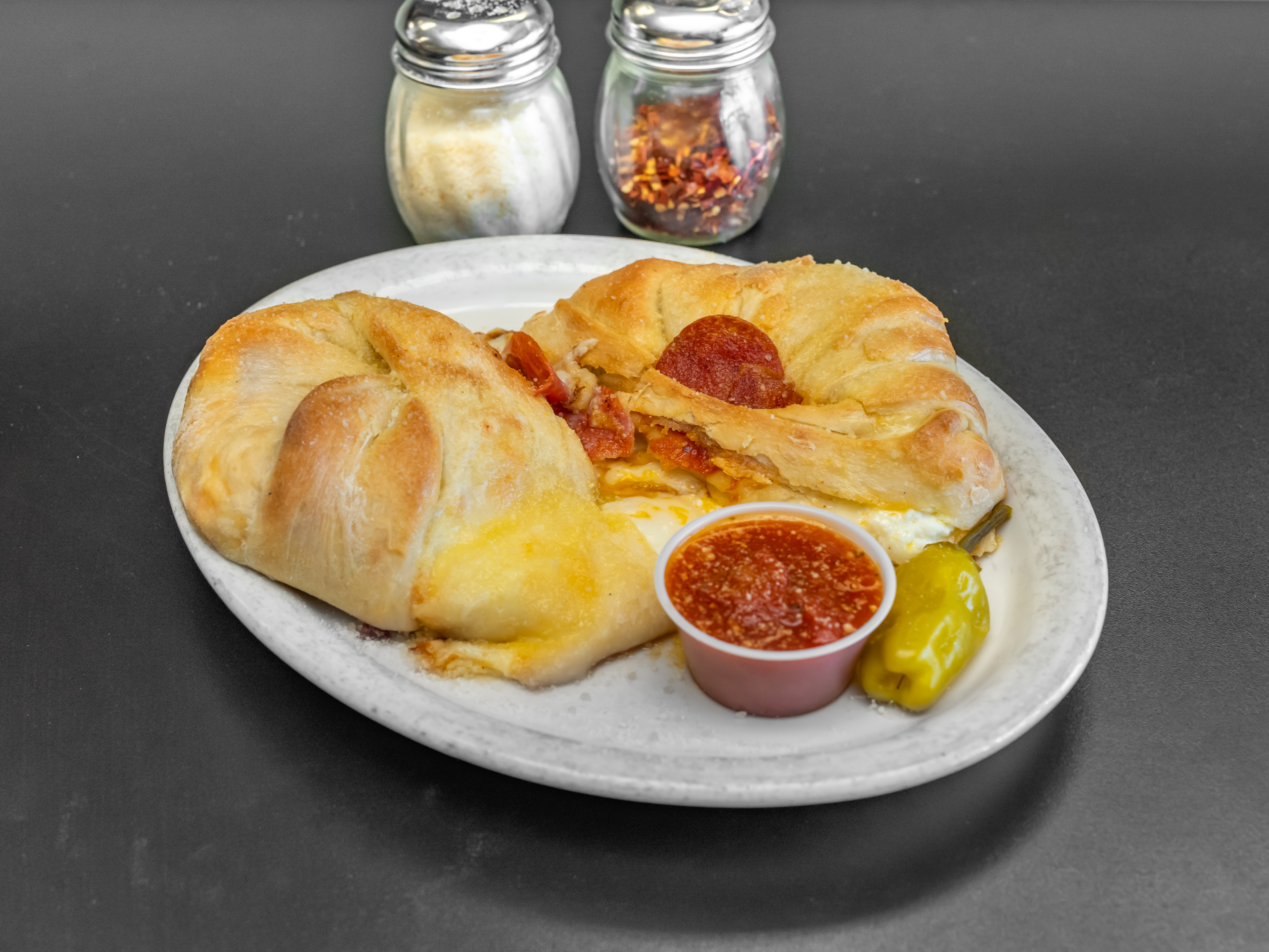 Order Calzone food online from Tonti's Pizzeria store, Parker on bringmethat.com