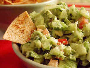 Order Guac & Chips food online from Racquets Downtown Grill store, Muskegon on bringmethat.com