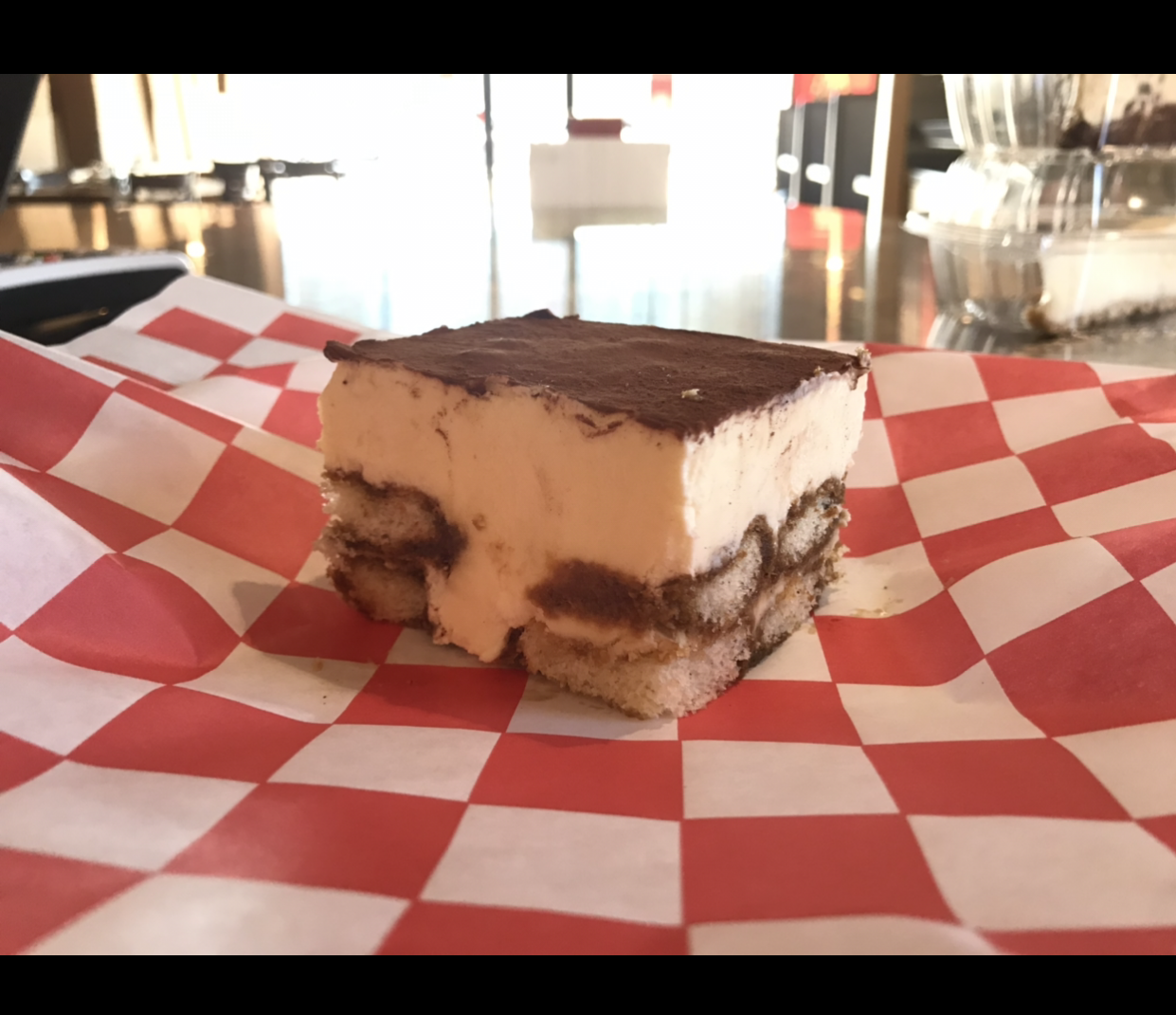Order Tiramisu food online from Johnny's Pizza store, Cary on bringmethat.com