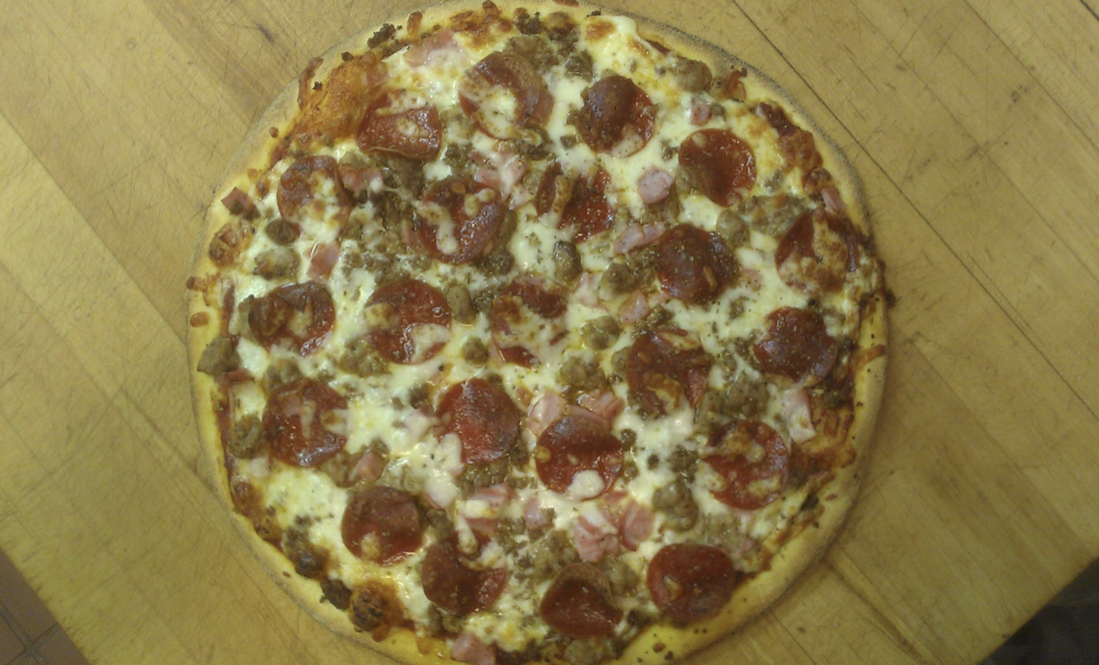 Order All Meat Pizza food online from Zio Johno's Spaghetti House store, Iowa City on bringmethat.com