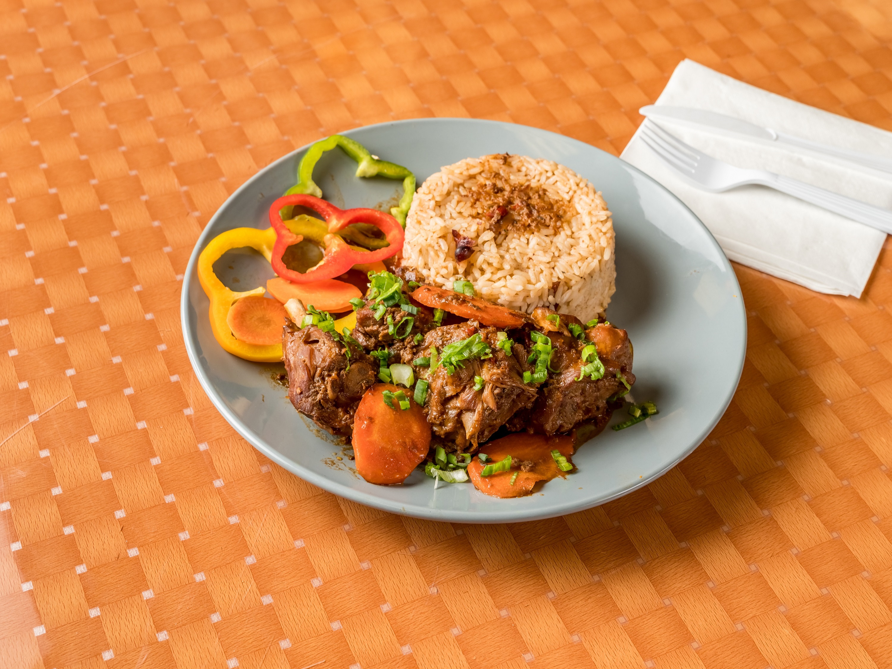 Order Brown Stewed Chicken Meal food online from Caribbean Spot store, Coram on bringmethat.com