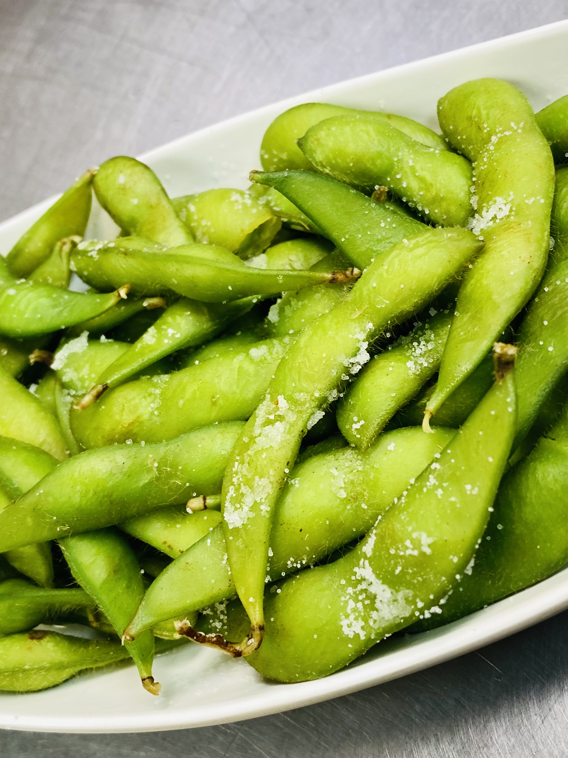 Order 28. Edamame food online from House of Pho store, Hoffman Estates on bringmethat.com