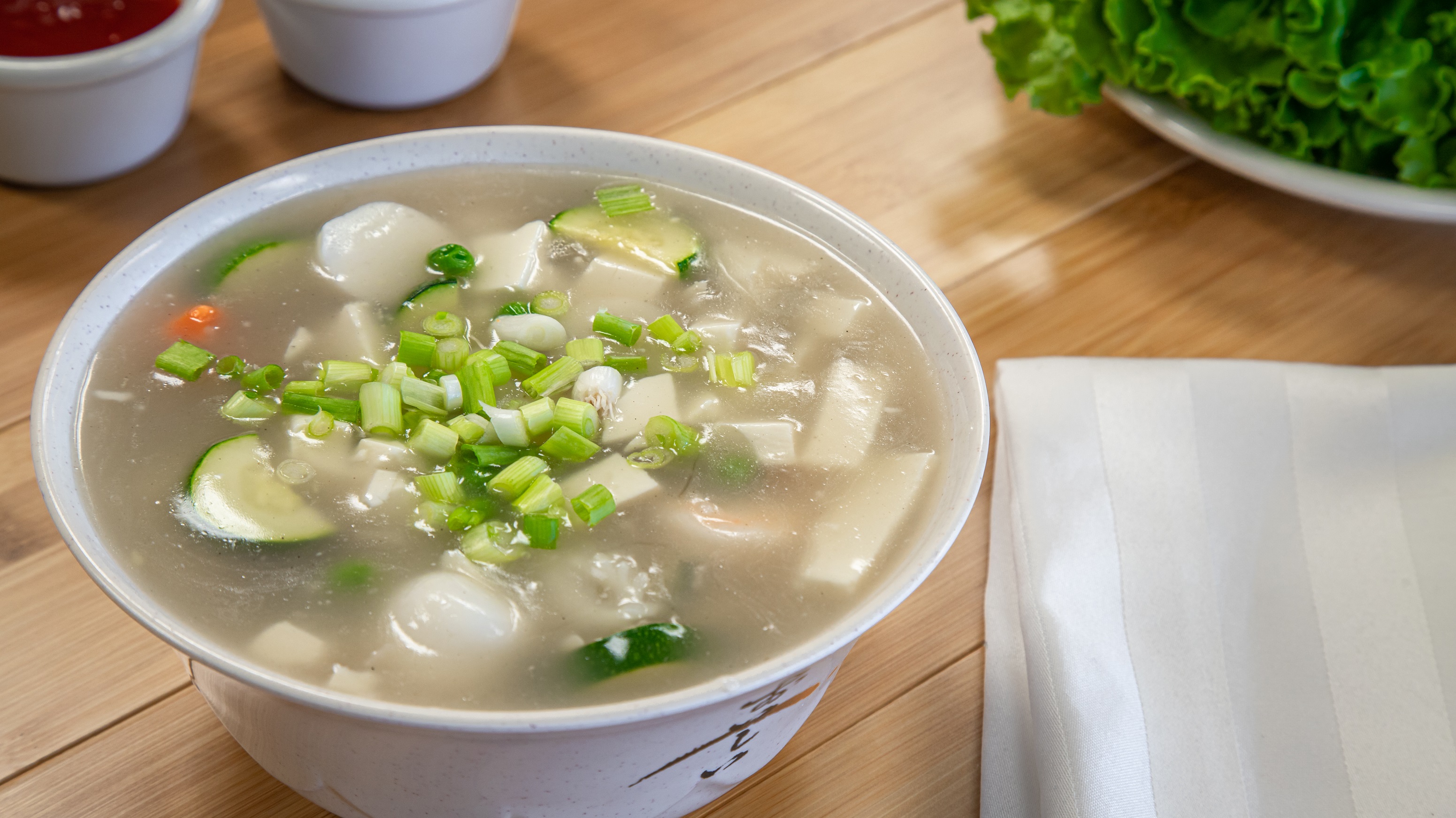 Order 34. Sea Food Tofu Soup food online from Pho Cafe Hong Kong Diner store, Reno on bringmethat.com