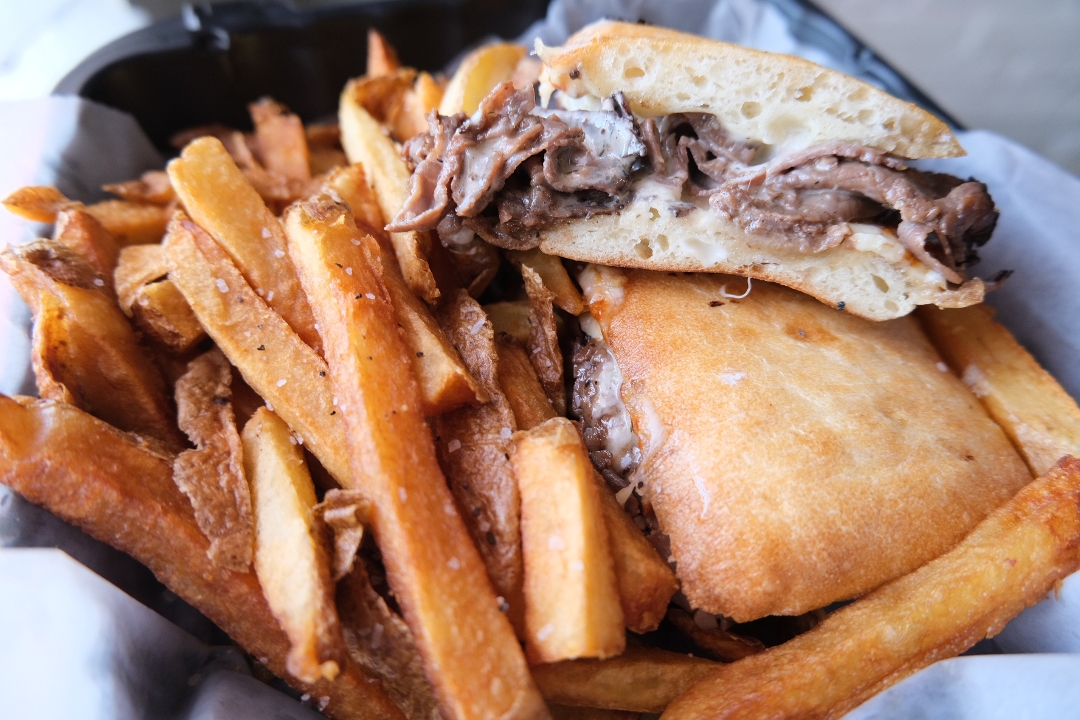 Order French Dip Panini* food online from Alexander's Tavern store, Baltimore on bringmethat.com