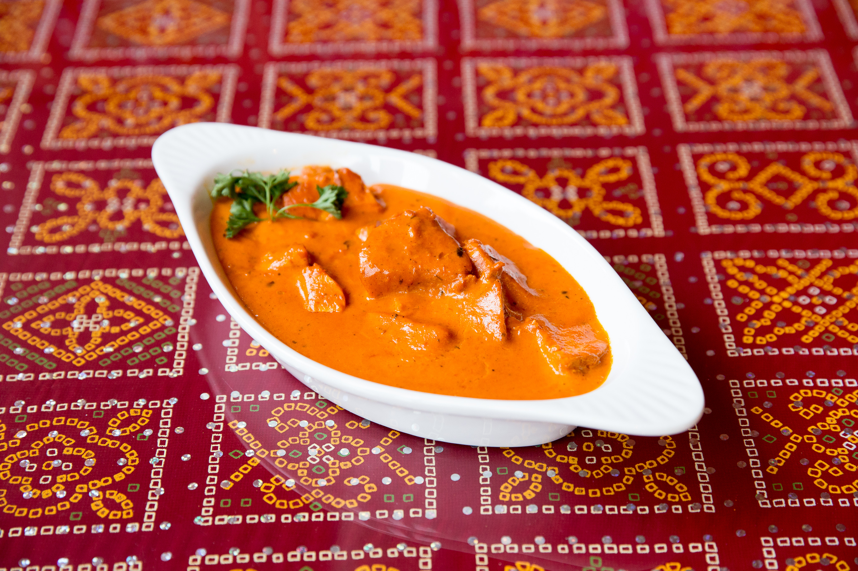 Order Buttered Chicken food online from Aamar Indian Restaurant store, Los Angeles on bringmethat.com