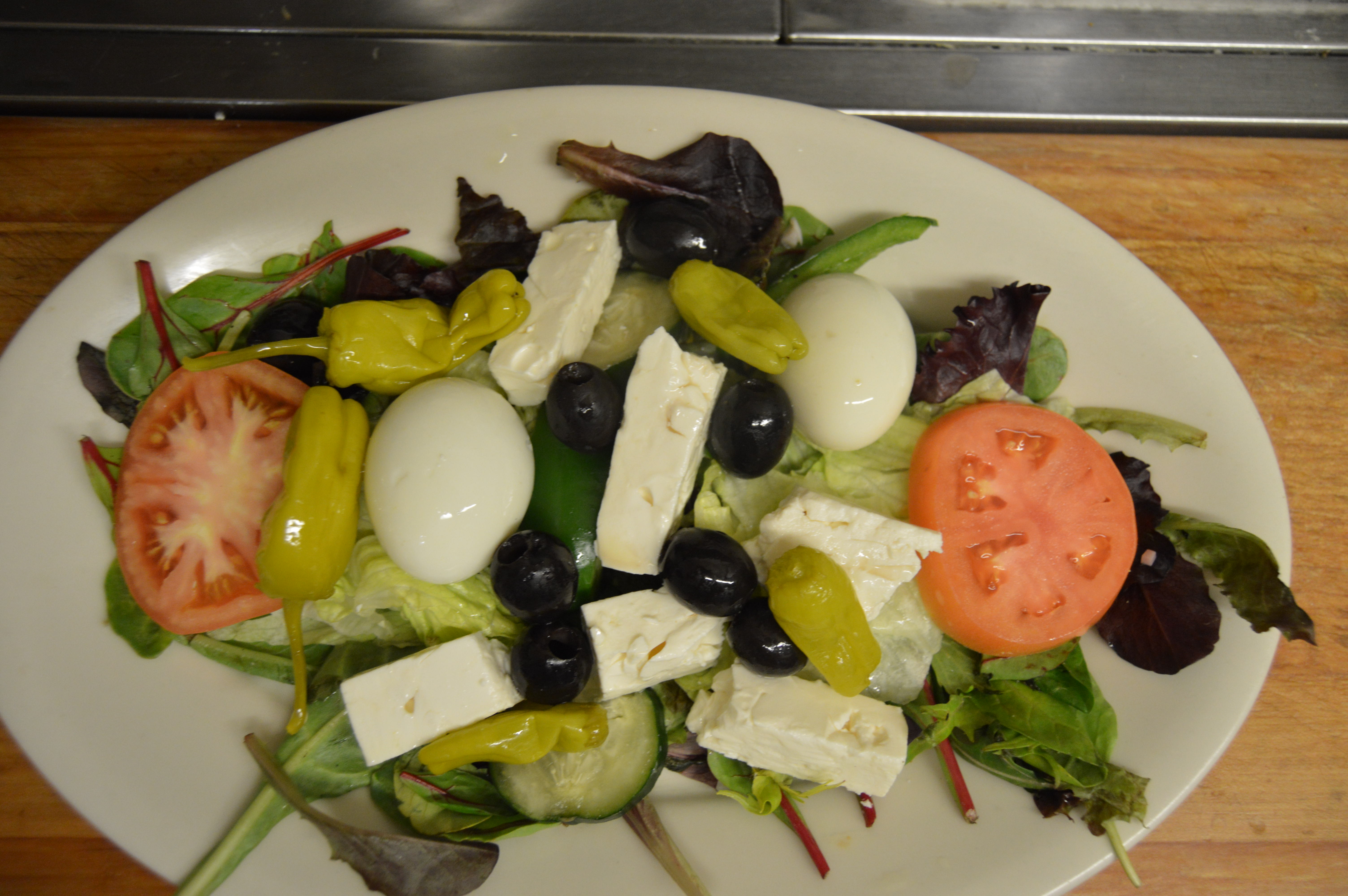 Order Greek Salad food online from Angelas family restaurant store, Cleveland on bringmethat.com
