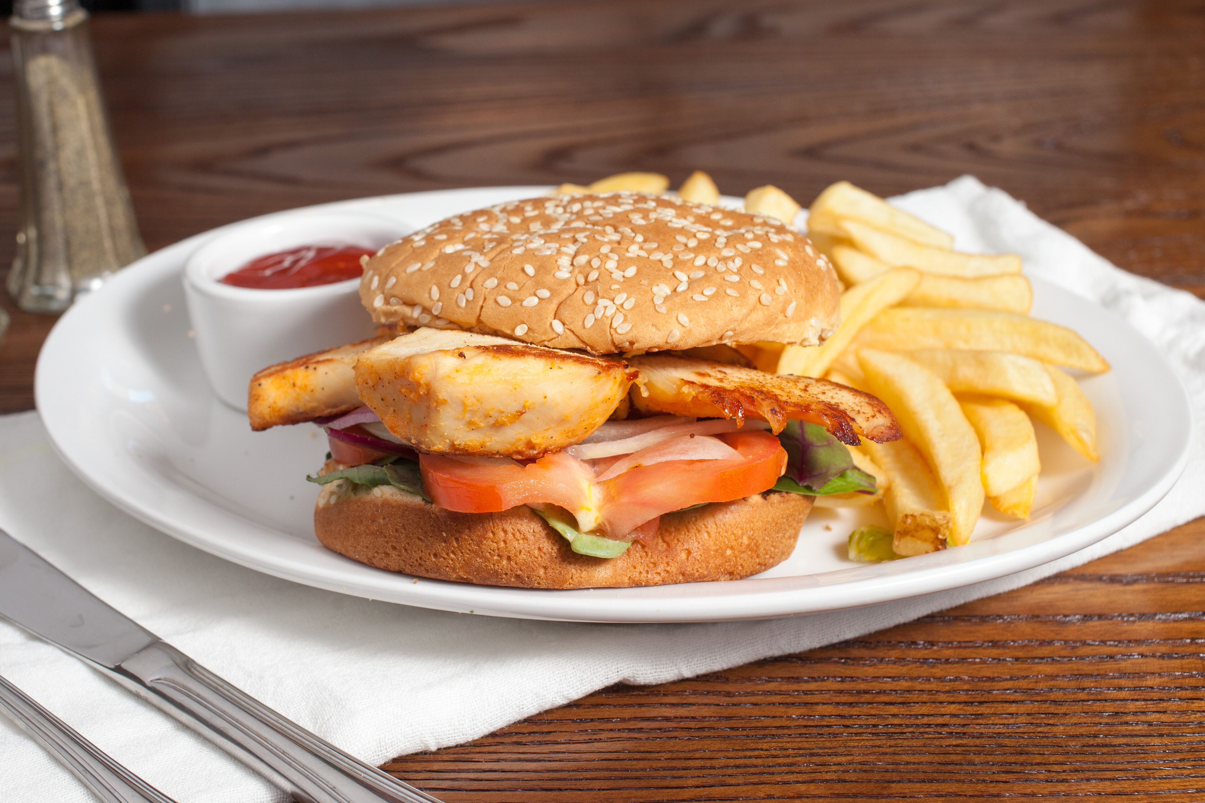 Order Chicken Burger with Fries food online from Himalayan Pizza & Momo store, San Francisco on bringmethat.com