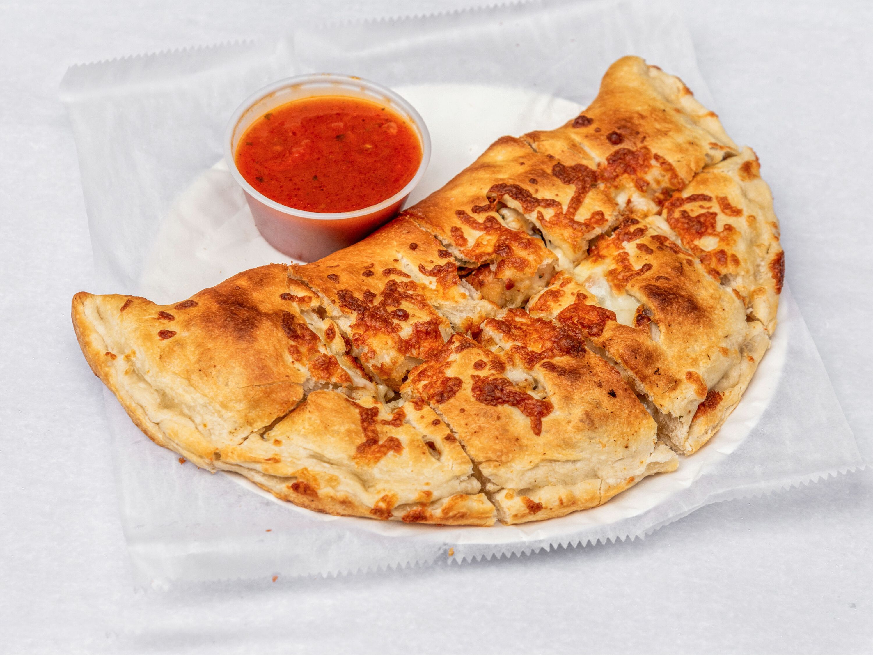Order Calzone food online from Arboretum Pizza Grill store, Roslindale on bringmethat.com