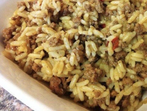 Order Cajun Rice food online from Smokin Barn Yard store, Houston on bringmethat.com