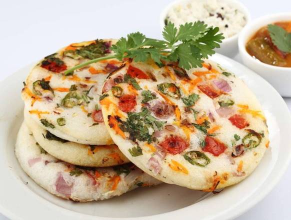 Order Mix Veg Uthappam food online from Baisakhi Dhaba store, Topeka on bringmethat.com