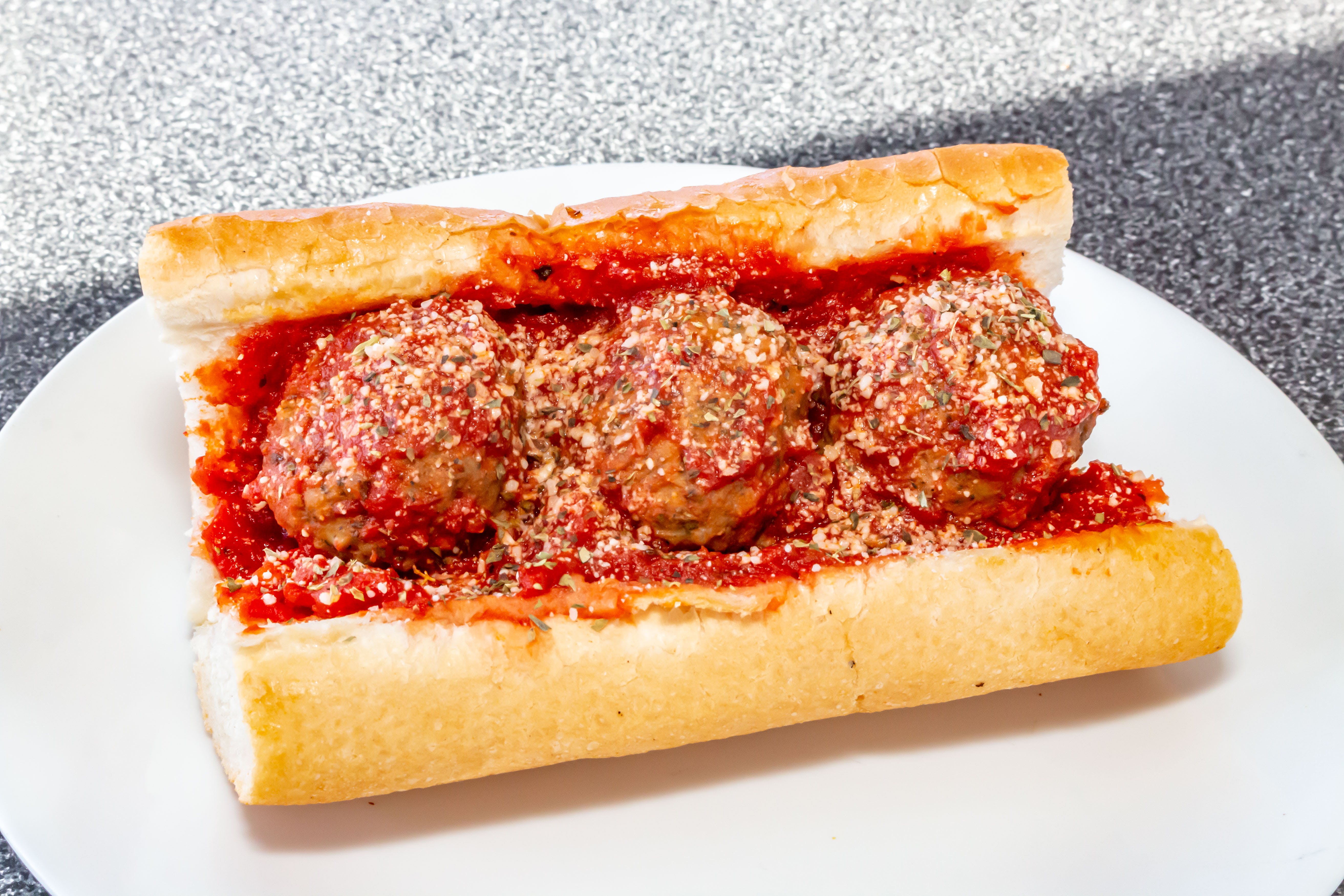 Order Meatball Sandwich - Sandwich food online from Mario's Pizza store, Northbrook on bringmethat.com