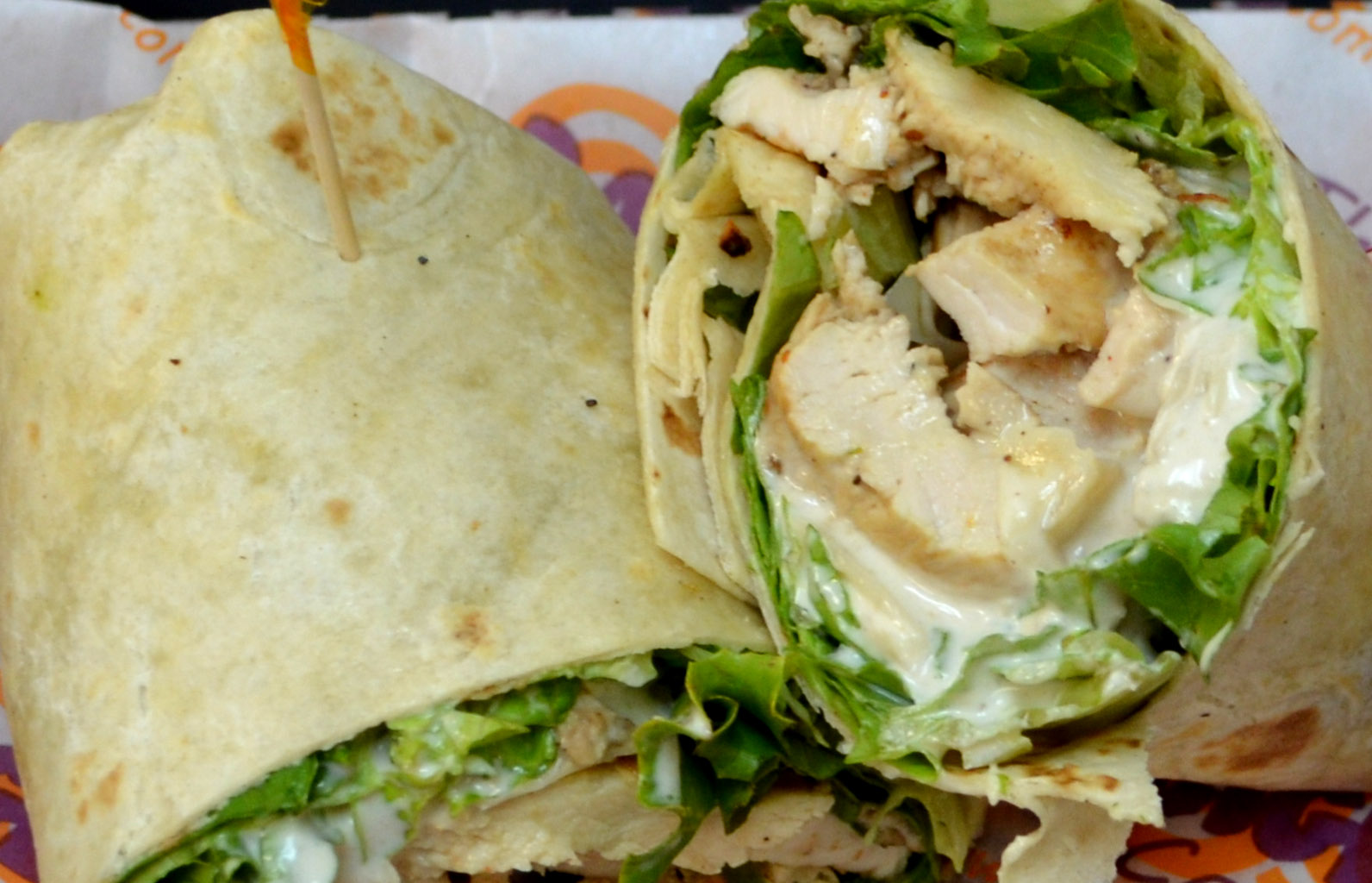 Order Grilled Chicken Caesar Wrap food online from Bagel Cafe store, Herndon on bringmethat.com