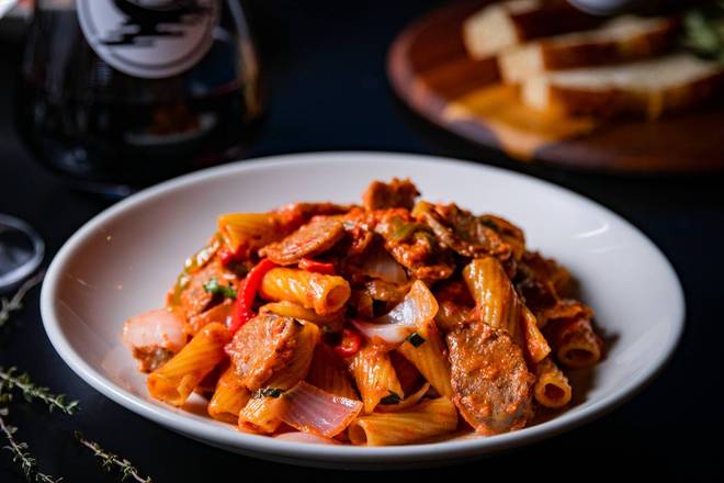 Order Sausage & Peppers Rigatoni food online from Anthony's Eatalian store, Dallas on bringmethat.com