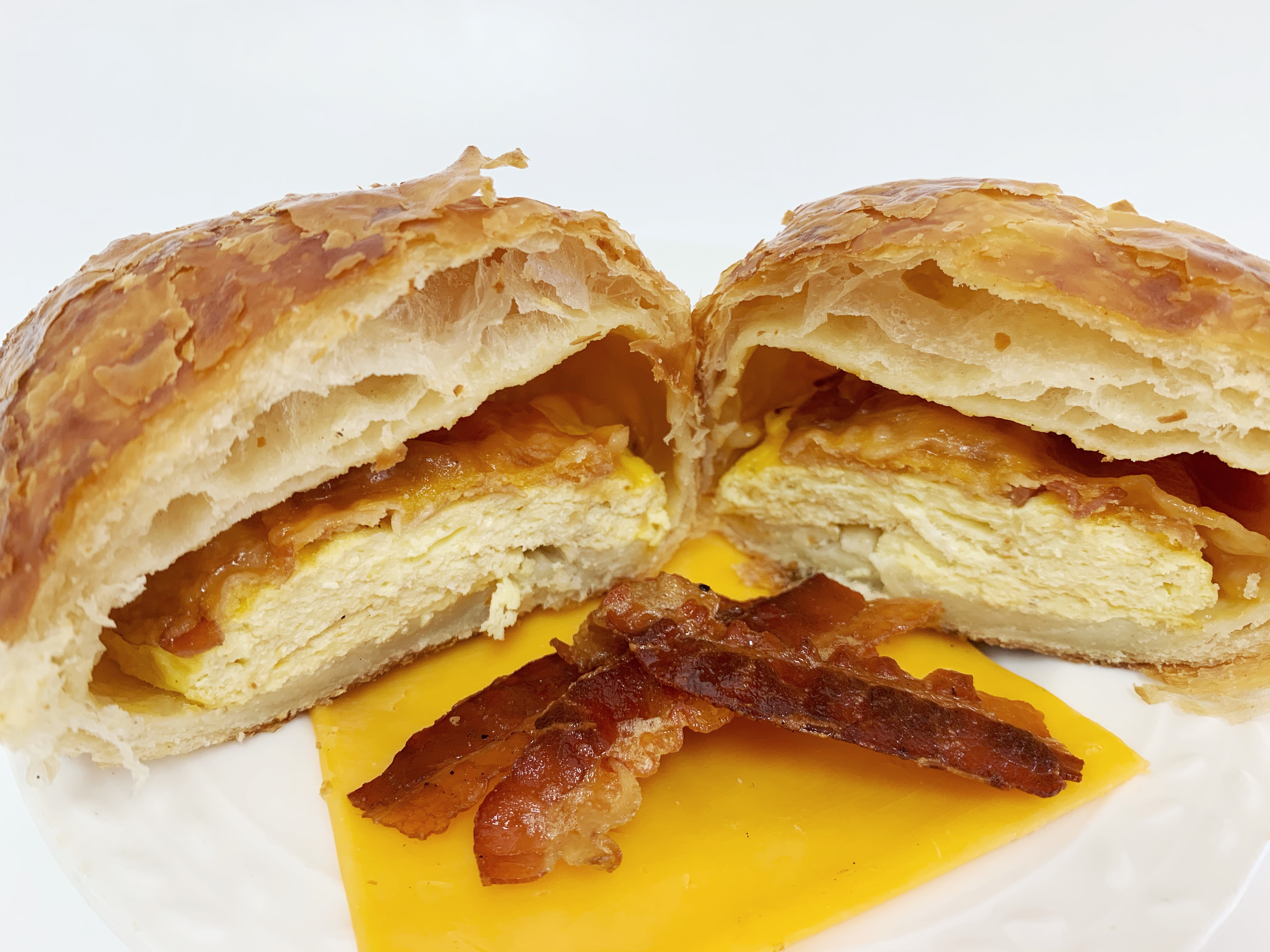 Order Bacon, Egg & Cheddar Croissant food online from Terrace St Bakery store, Philadelphia on bringmethat.com