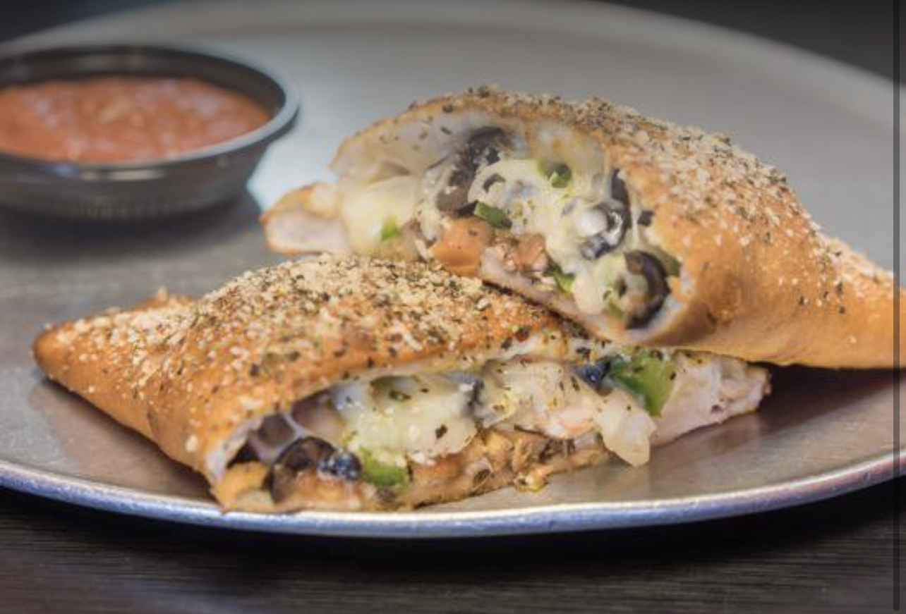Order Veggie Calzone food online from Georgio's Pizza store, Cleveland on bringmethat.com
