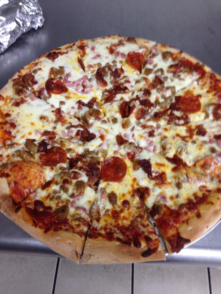 Order Meatlover Pizza food online from Dough Boyz Pizzas & Phillys store, Council Bluffs on bringmethat.com