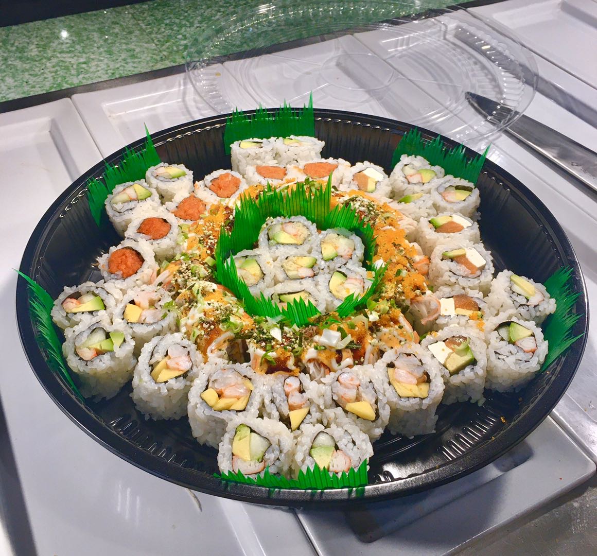 Order 10. Two Regular Rolls, 2 Specialty Rolls and 9 Pieces Sashimi Special food online from Wei Buffet store, Roselle Park on bringmethat.com