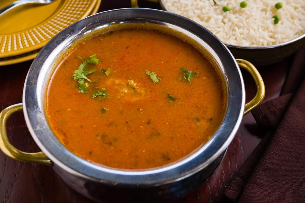Order Goa Fish Curry food online from Dhaba indian cuisine store, New York on bringmethat.com