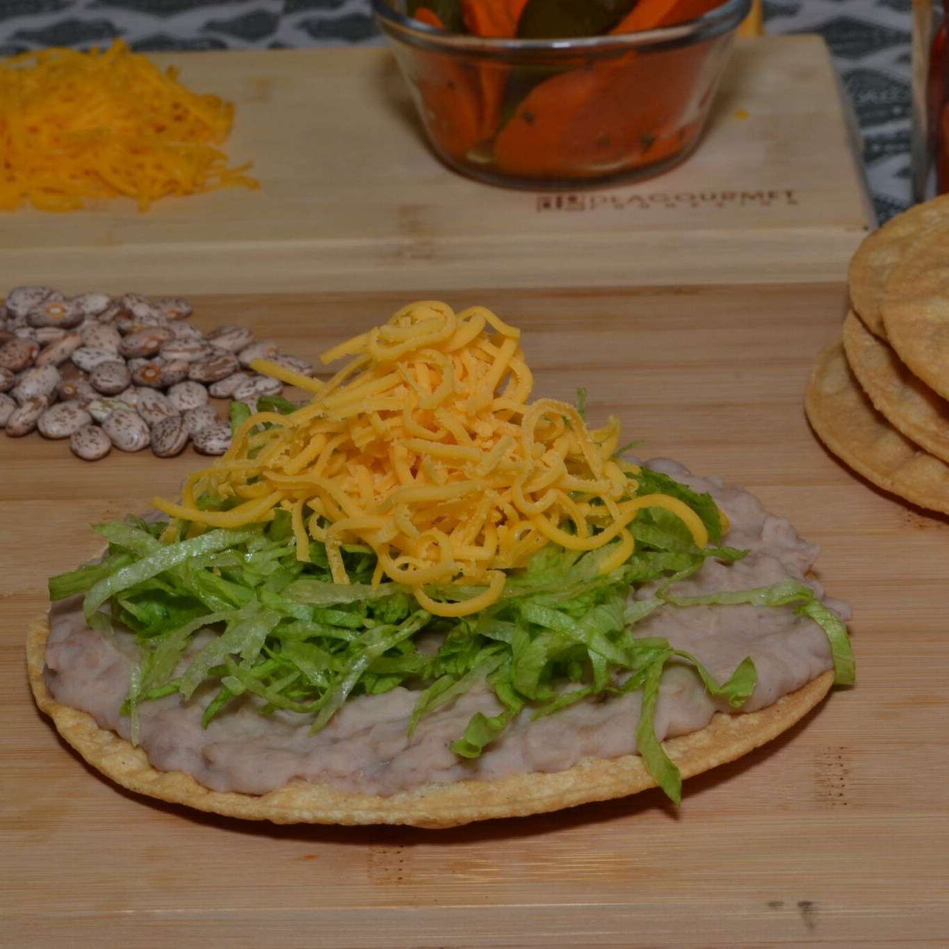 Order Beans Tostada food online from Federicos Mexican Food store, Glendale on bringmethat.com