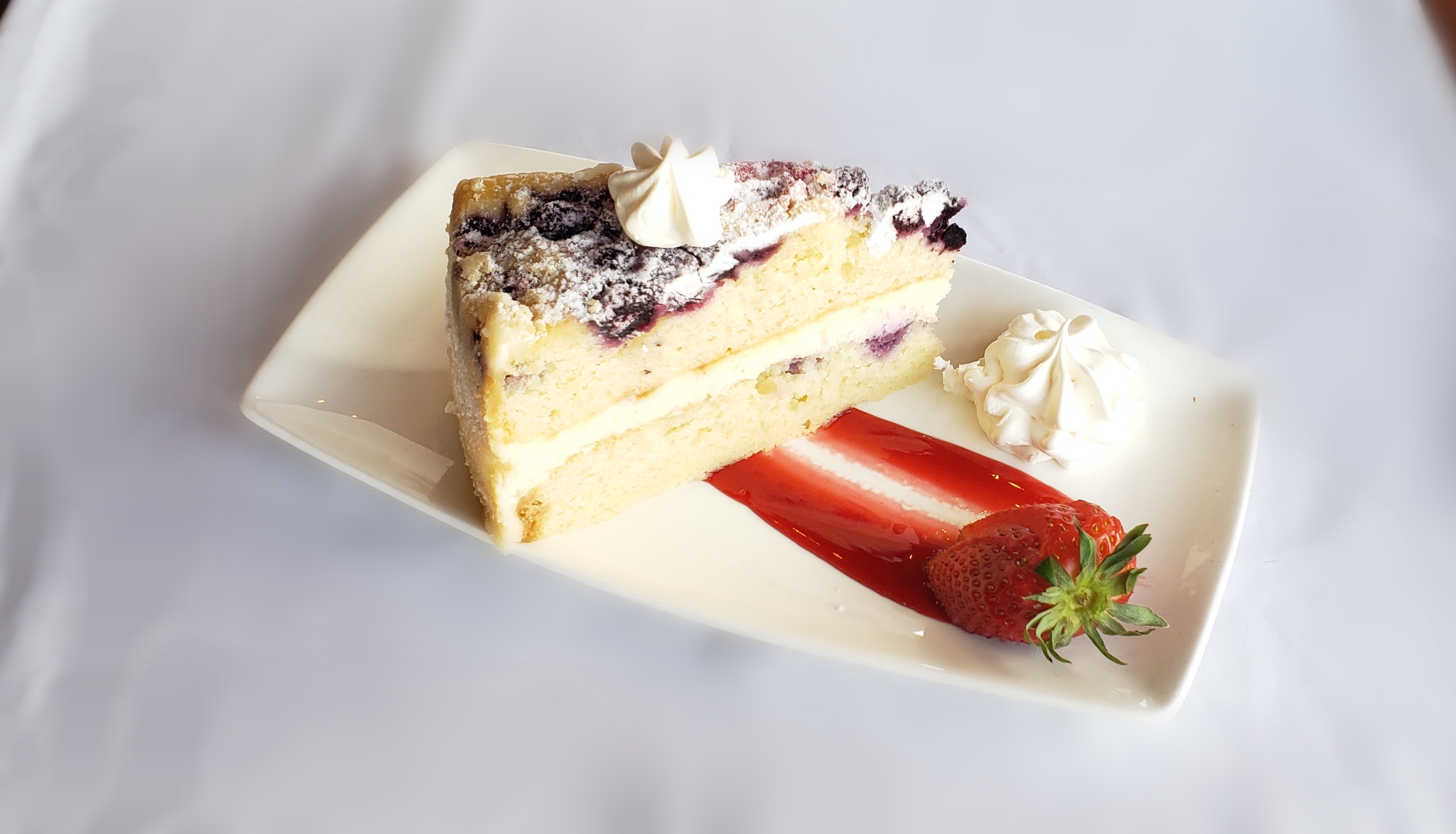 Order Layered Lemon Berry Cake food online from D Delicious Desserts store, Golden on bringmethat.com