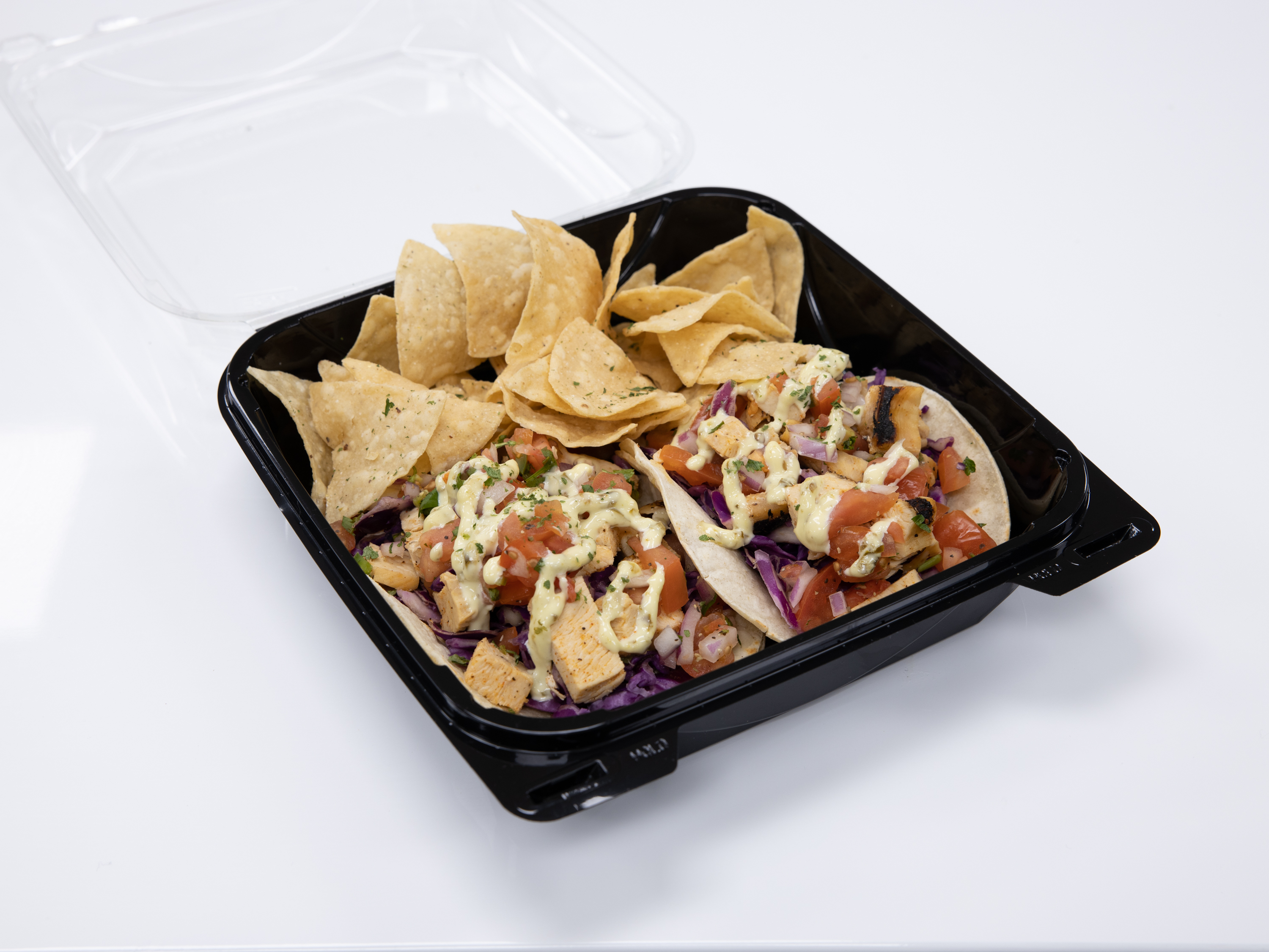 Order Two Chicken Taco with Chip and Salsa food online from Foodieum Cafeteria store, Norwalk on bringmethat.com