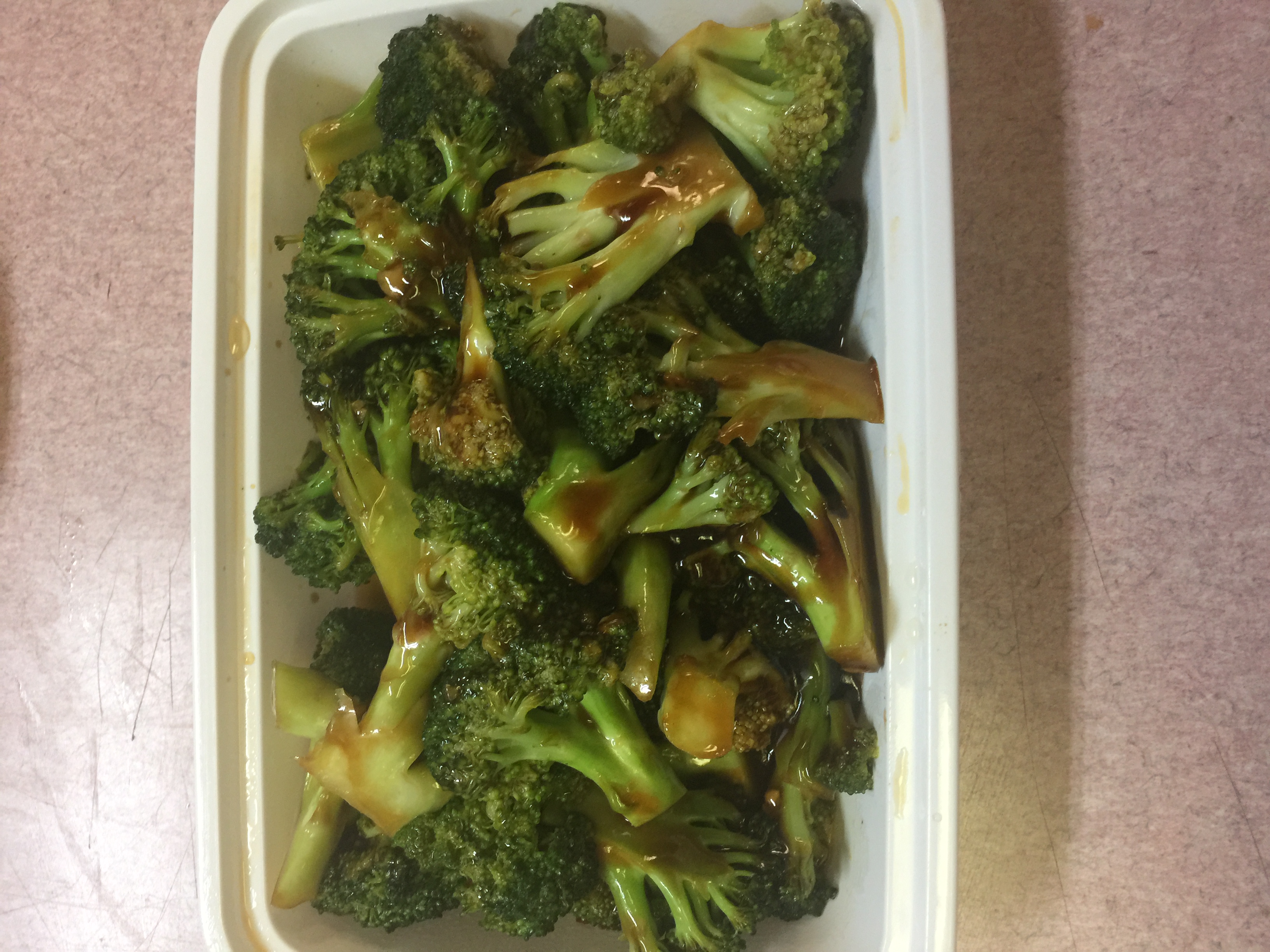 Order 65. Sauteed Broccoli in Garlic Sauce food online from China Wok store, Harrison on bringmethat.com
