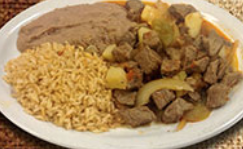 Order Carne Guisada food online from Two Amigos store, Houston on bringmethat.com