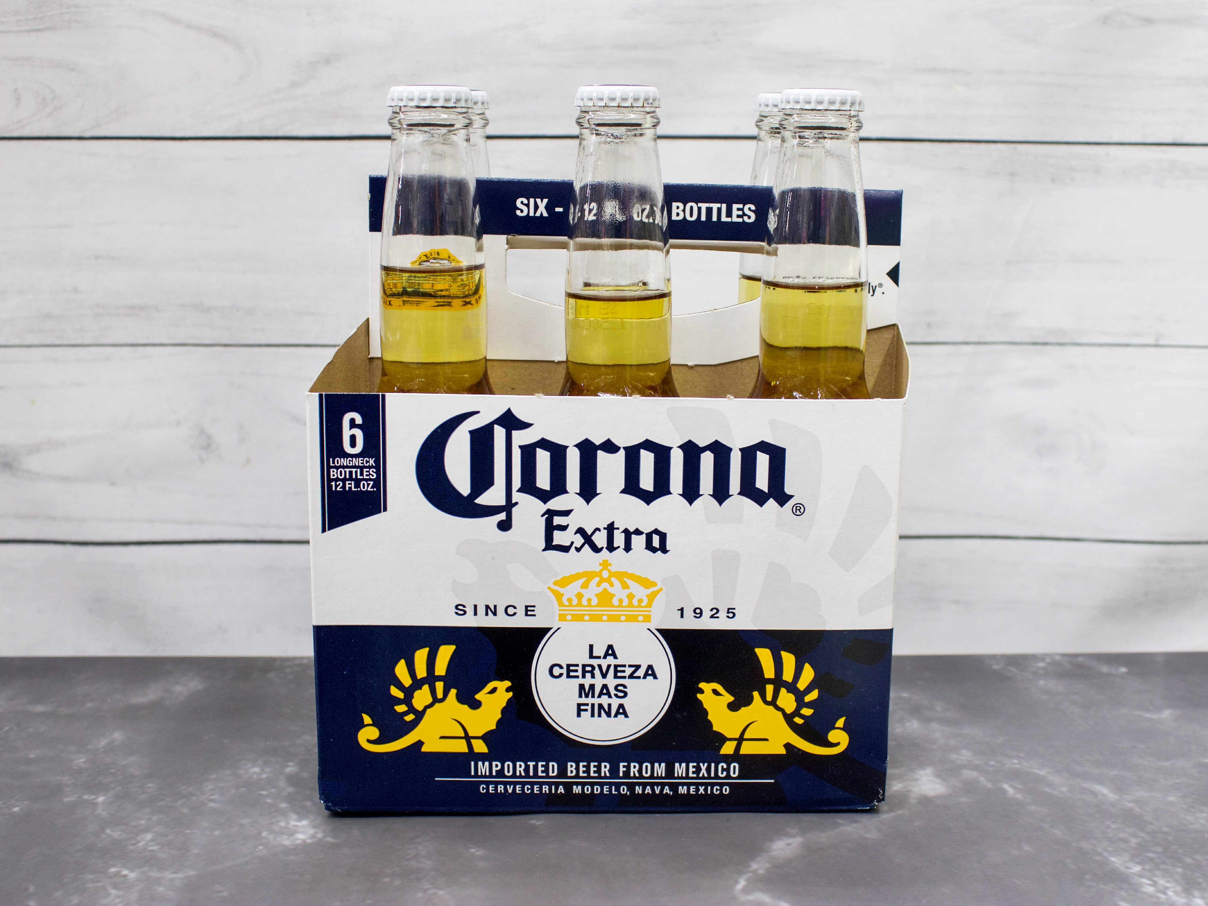 Order 12 oz. Corona Familiar, 6-pack Bottles ABV 4.5 % food online from Bailey Plaza Liquors store, Mountain View on bringmethat.com