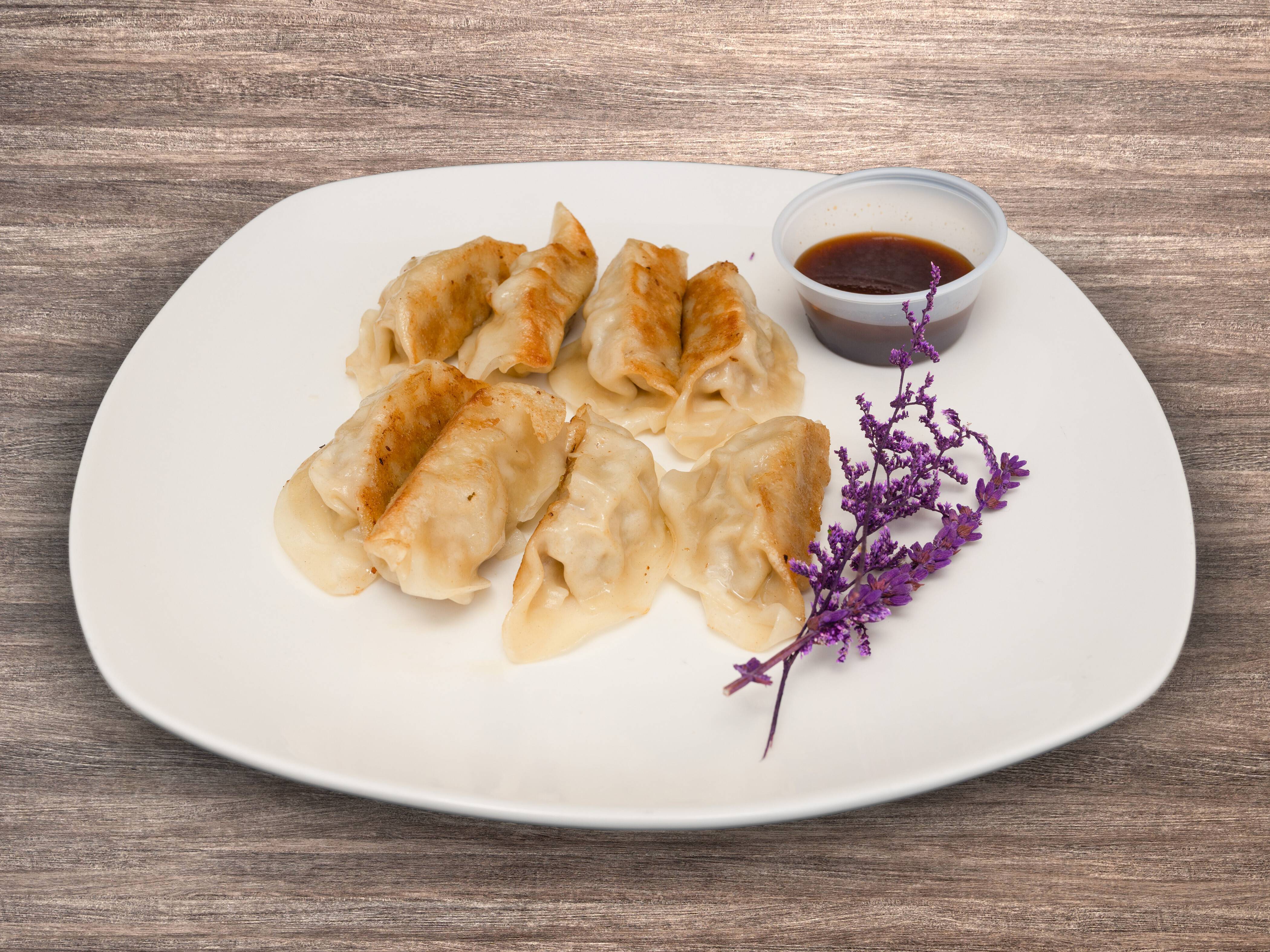 Order Pan Fried Gyoza (pork 8 pieces) food online from V Create store, North Brunswick on bringmethat.com