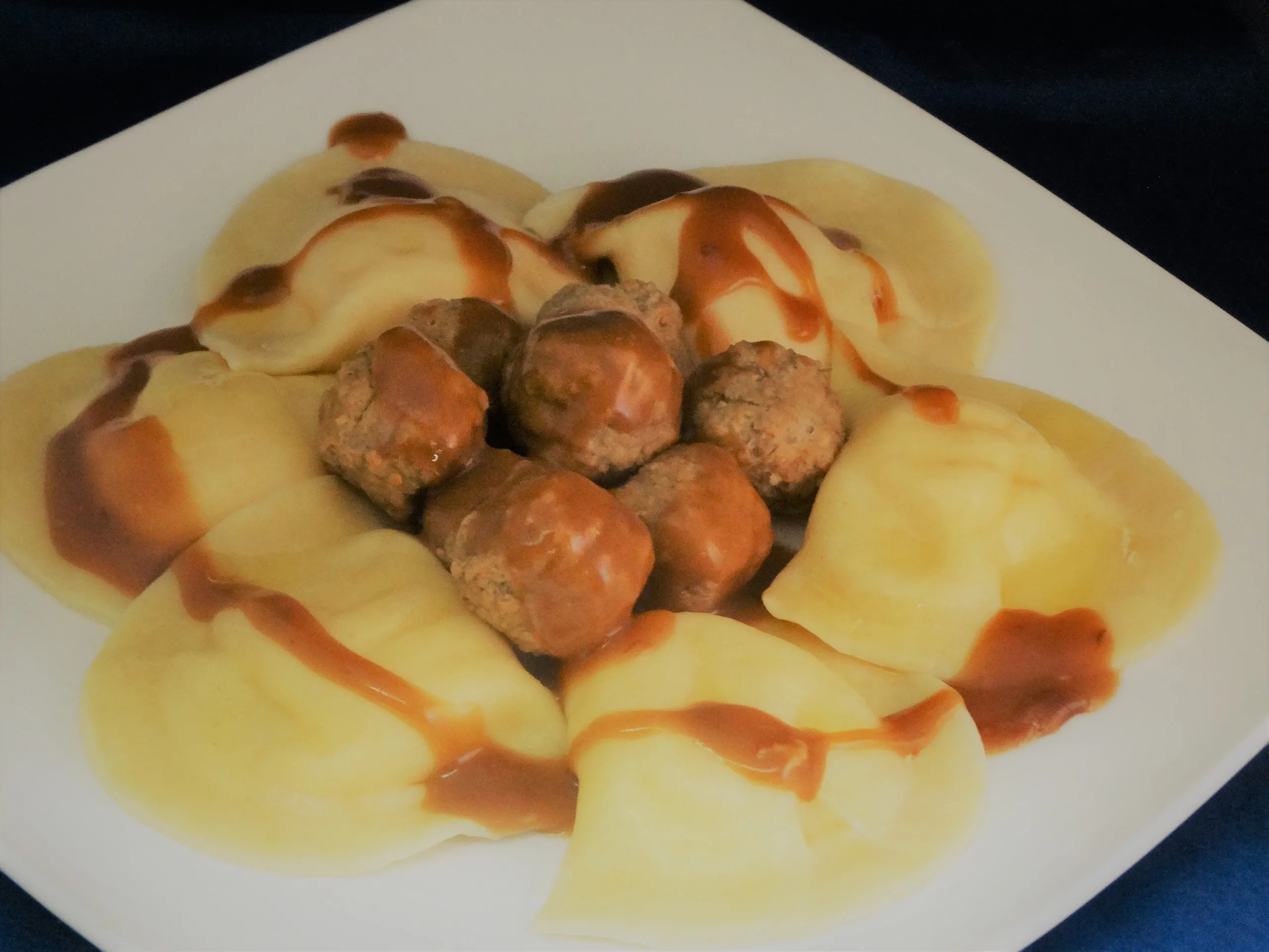 Order #9. Meatballs Over 6 Potato and Cheese Pierogies food online from Forgotten Taste store, Wexford on bringmethat.com