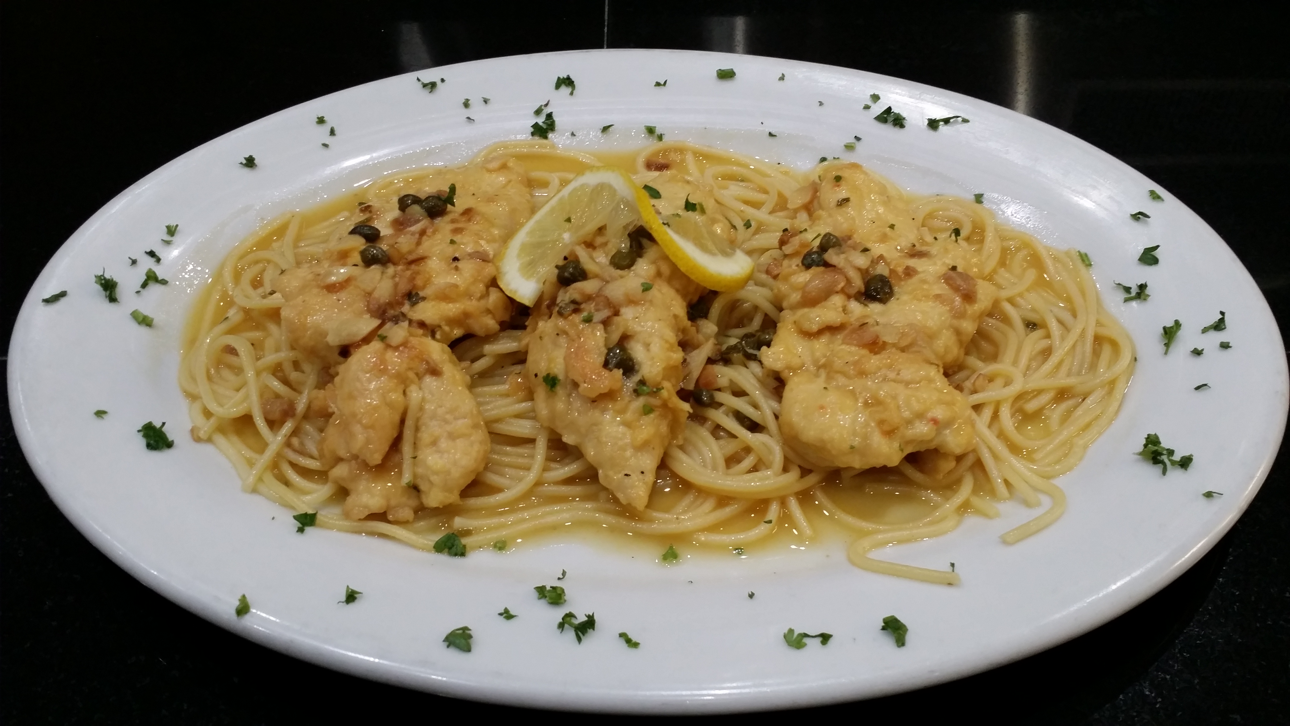 Order Piccata over Spaghetti Dinner food online from Pasta On Time store, Levittown on bringmethat.com