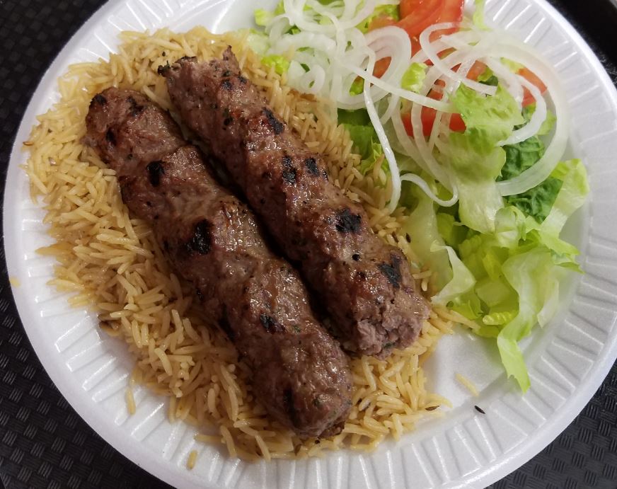 Order 49. Seikh Kabab with Rice and Salad food online from Crown Fried Chicken store, Worcester on bringmethat.com