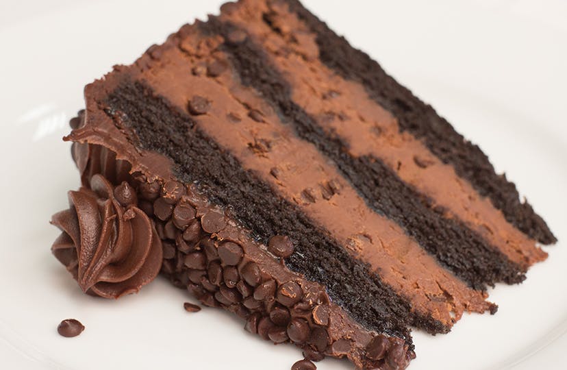 Order Triple Chocolate Layer Cake - Dessert food online from NYPD Pizza store, Orlando on bringmethat.com
