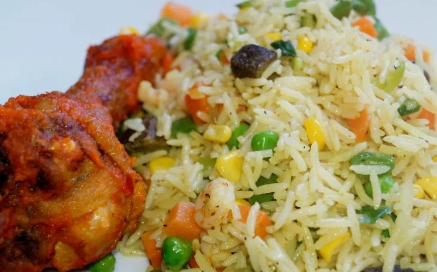 Order Fried Rice food online from Intercontinental Nigerian Restaurant store, Columbus on bringmethat.com