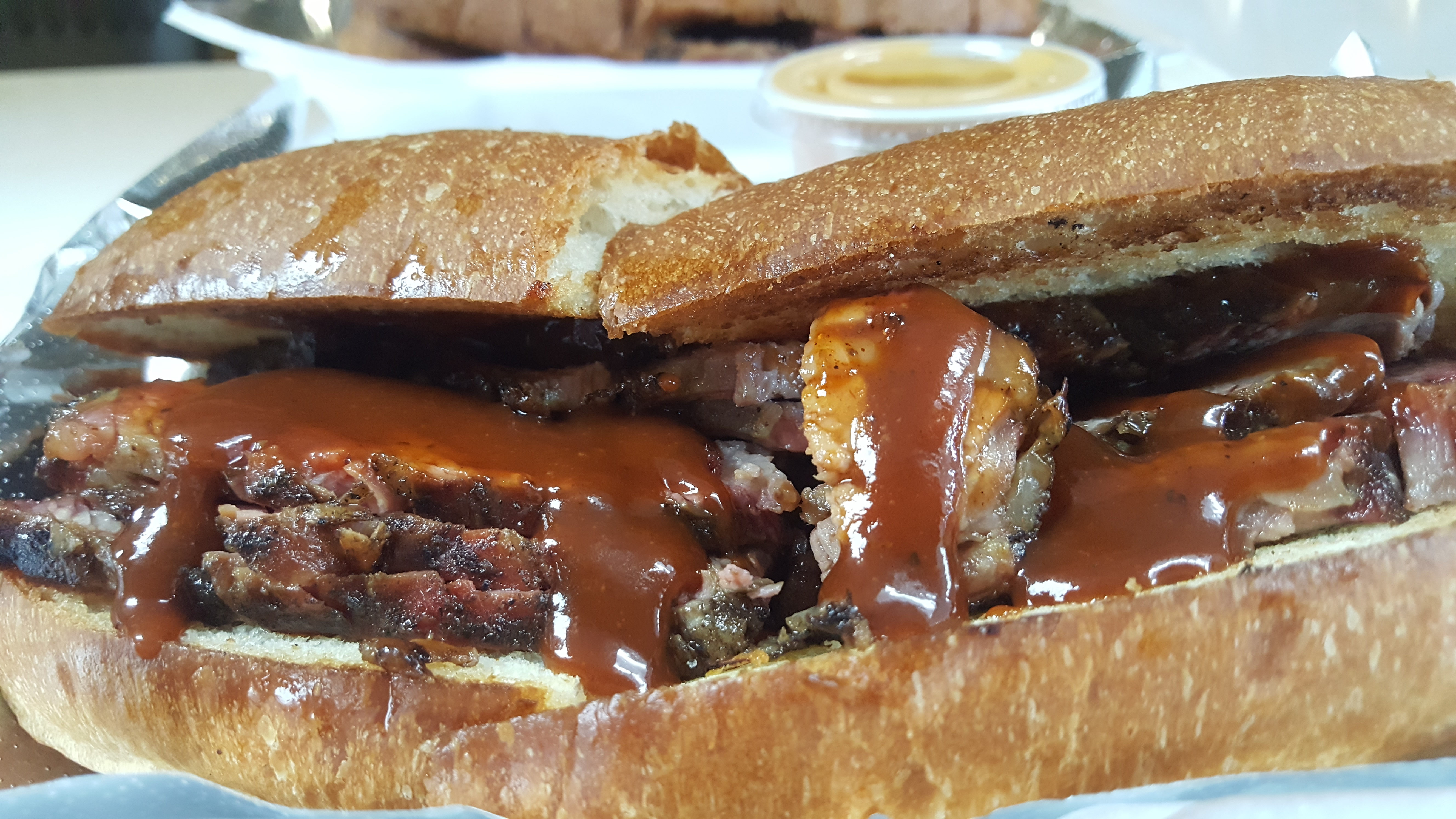 Order RR Ranch Signature Tri-Tip Sandwich food online from Bodacious Pig Barbecue store, Eagle on bringmethat.com