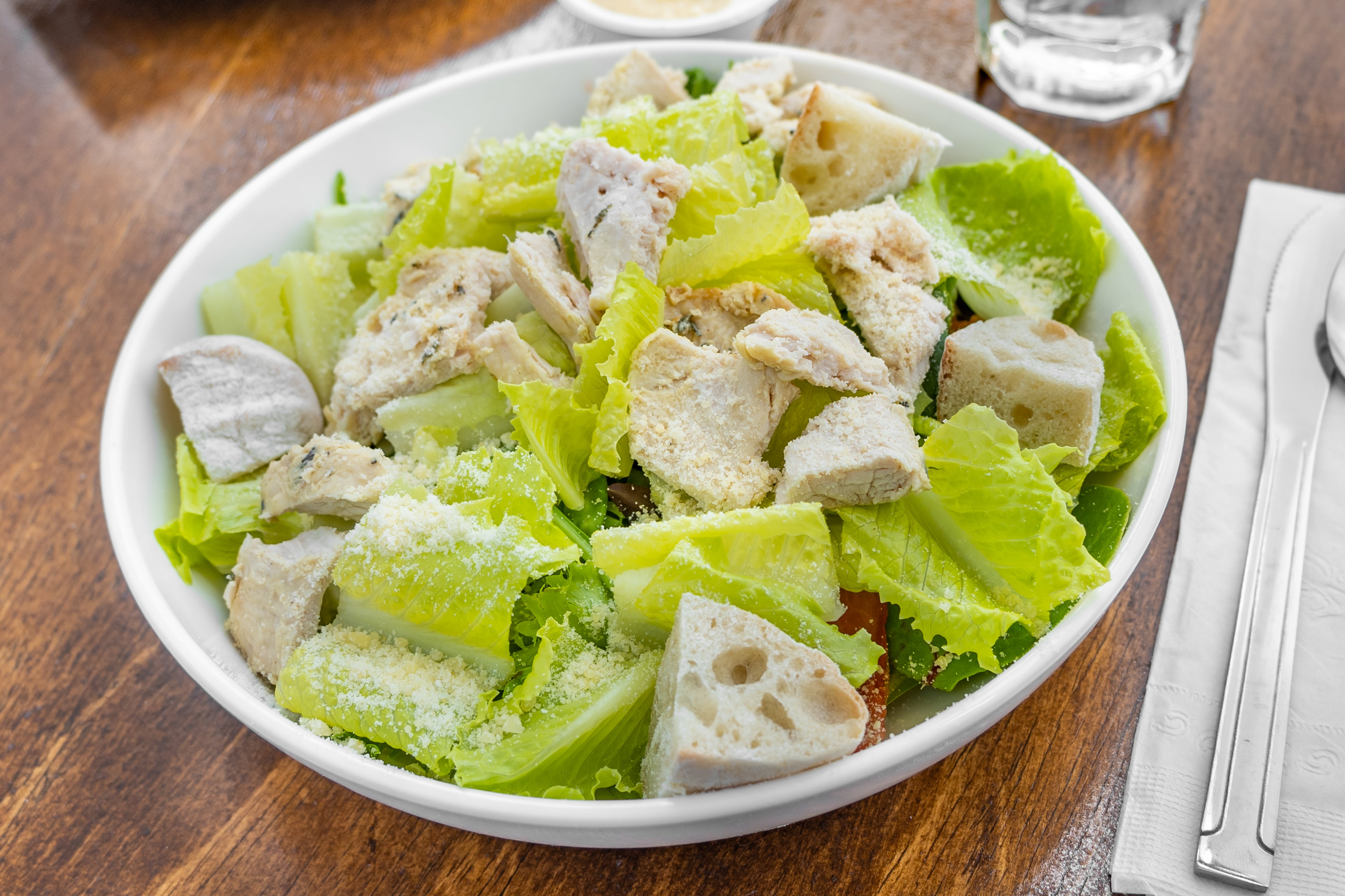 Order Classic Caesar Salad - Salad food online from Creme Brulee Bistro & Cafe store, Philadelphia on bringmethat.com